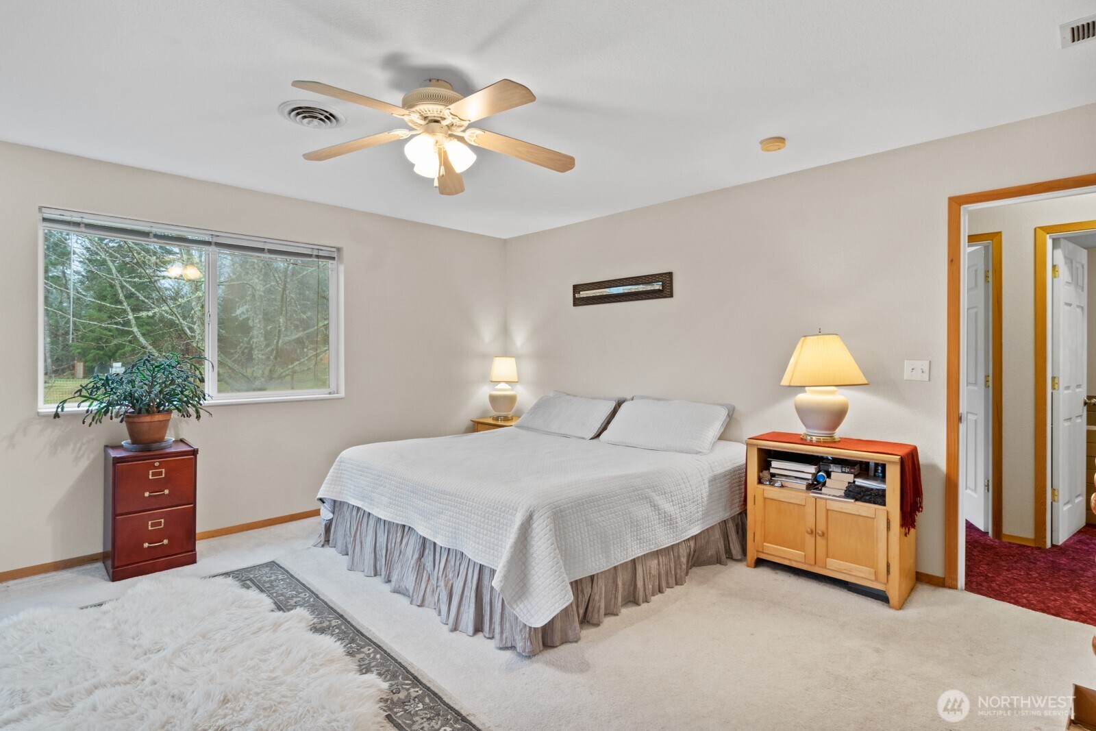 244 Martin Road Glenoma, WA 98336 - Photo 27 of 39 a bedroom with a bed and window