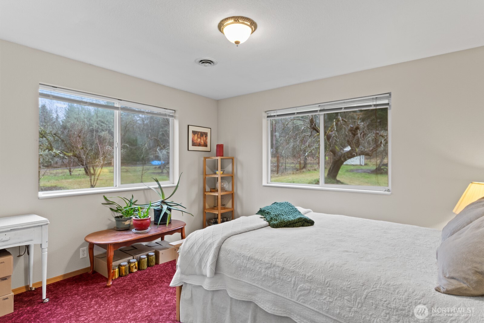 244 Martin Road Glenoma, WA 98336 - Photo 33 of 39 a bedroom with a bed and large windows