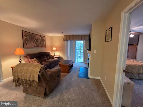 a bed room with a bed and a couch