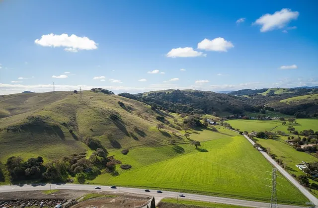 a view of an ocean and a mountain