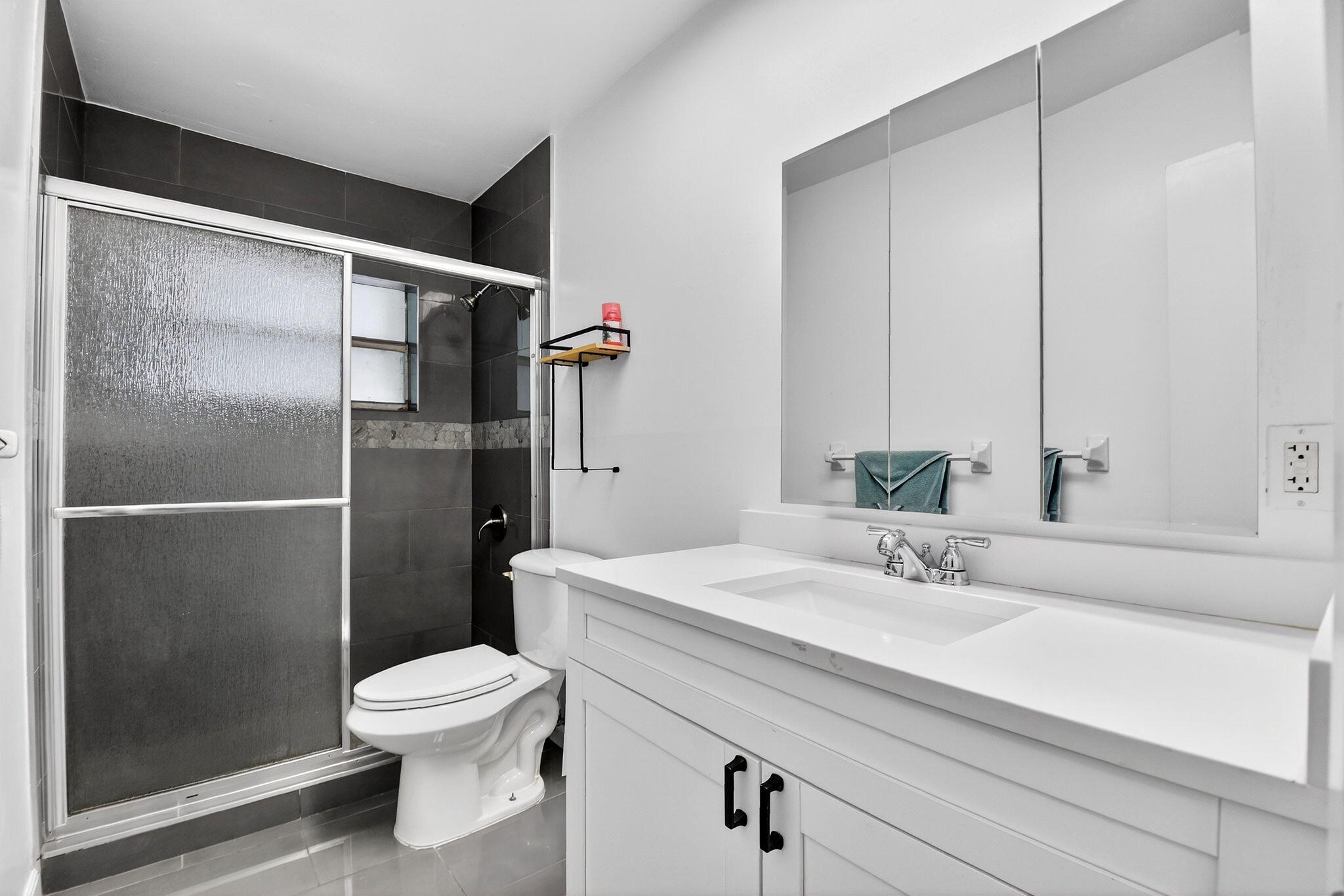 5721 Coconut Road West Palm Beach, FL 33413 - Photo 22 of 41 a bathroom with a sink toilet and shower