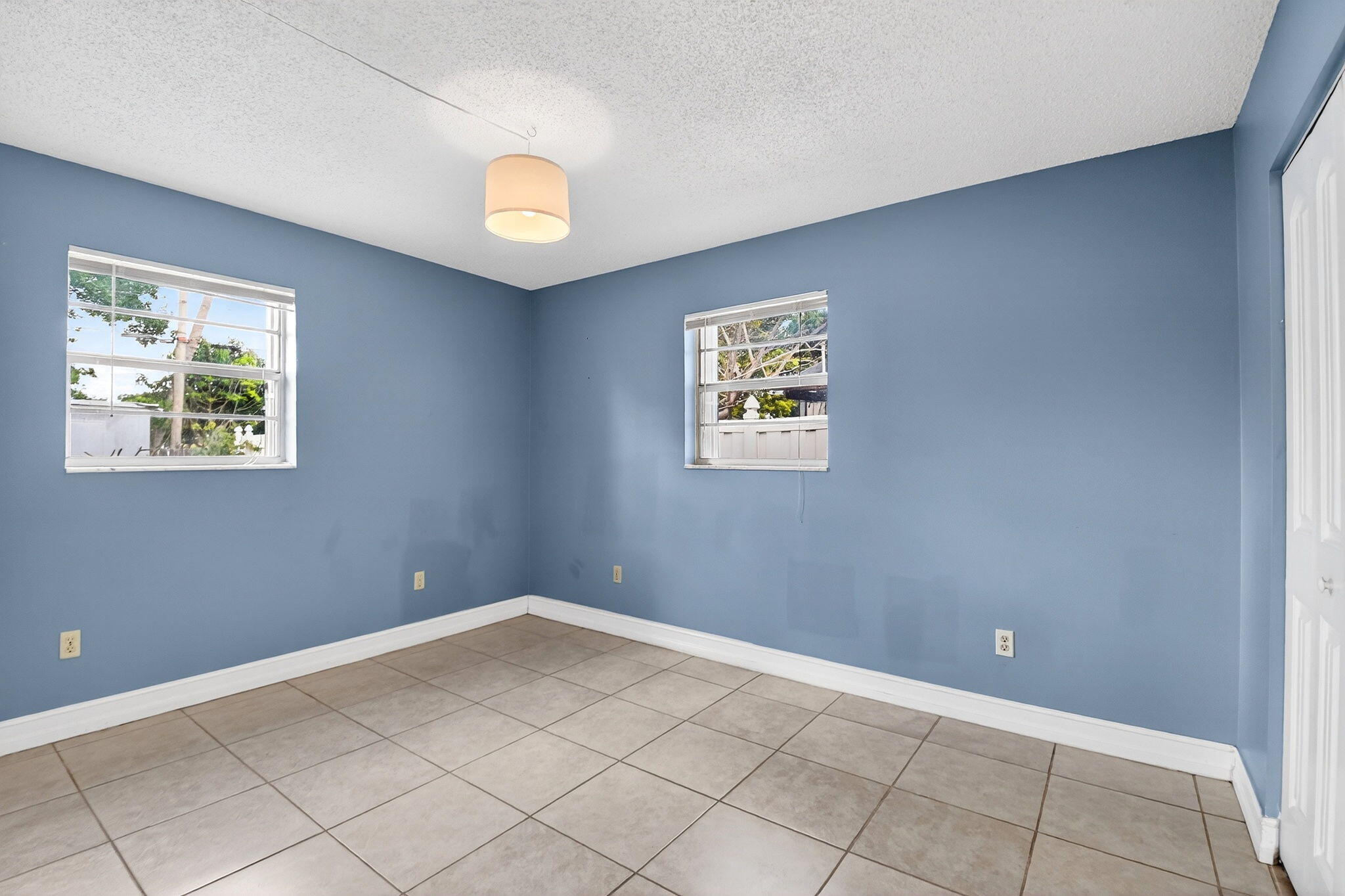 5721 Coconut Road West Palm Beach, FL 33413 - Photo 23 of 41 a view of an empty room with a window