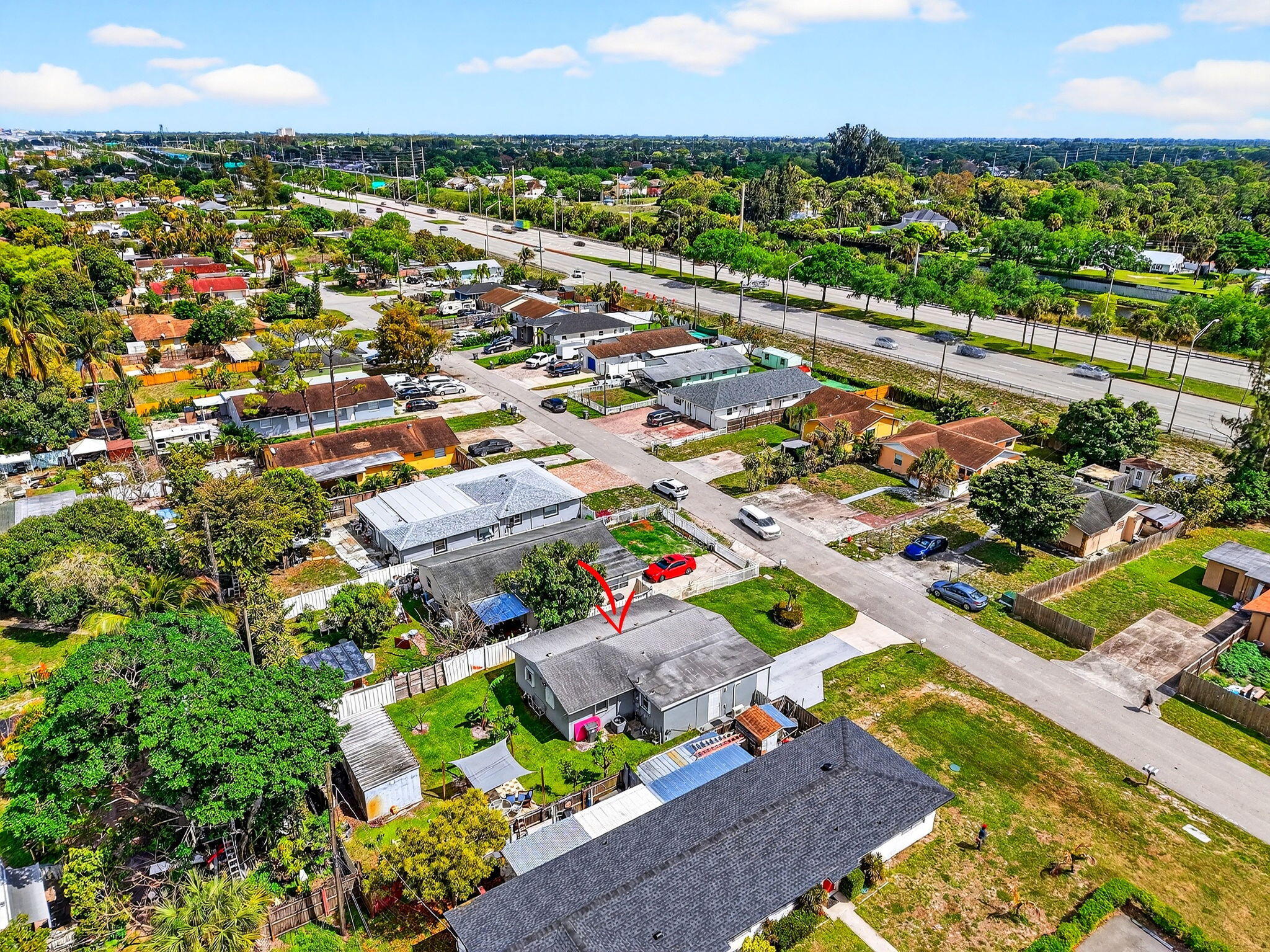 5721 Coconut Road West Palm Beach, FL 33413 - Photo 37 of 41 an aerial view of residential houses with outdoor space and swimming pool