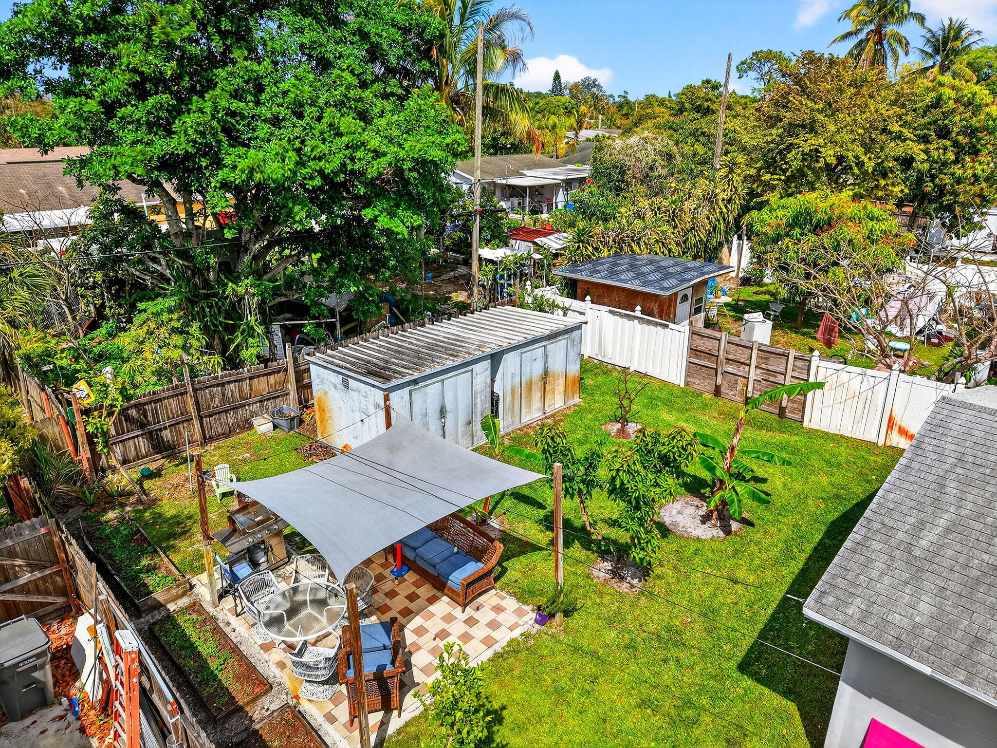 5721 Coconut Road West Palm Beach, FL 33413 - Photo 40 of 41 an aerial view of a house with a big yard