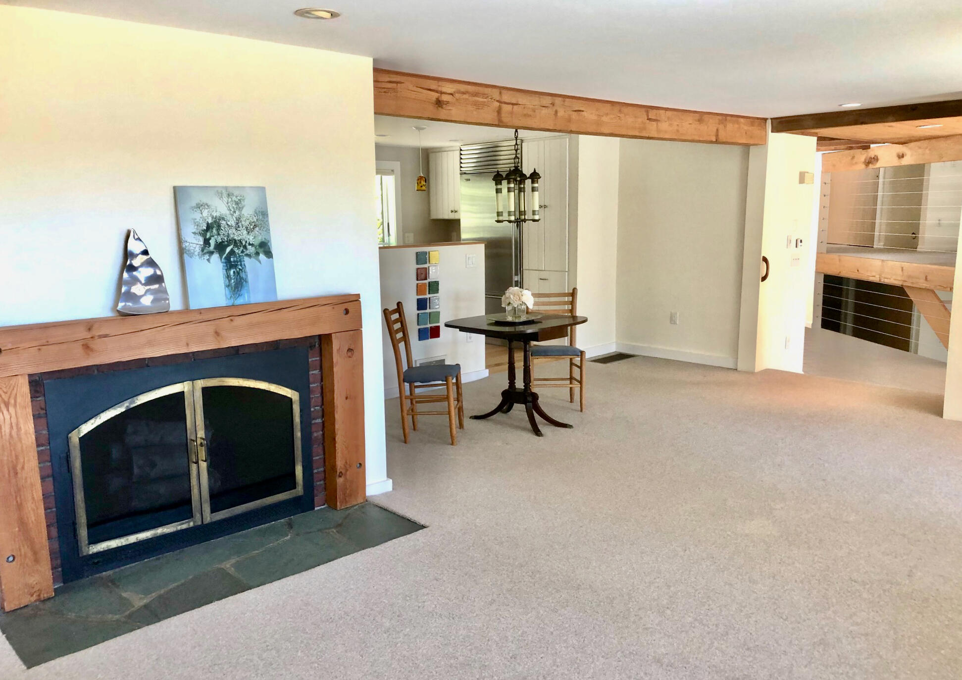 171 Monument Road Orleans, MA 02653 - Photo 14 of 47 a living room with furniture and a fireplace