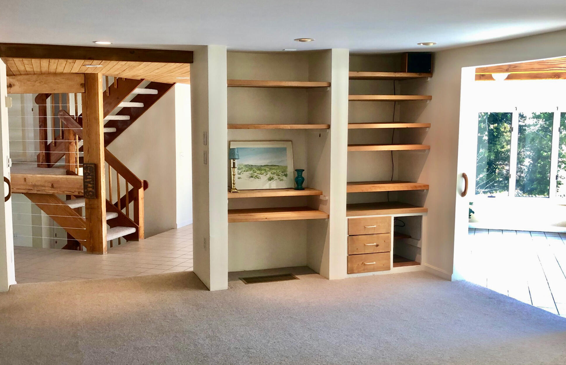 171 Monument Road Orleans, MA 02653 - Photo 15 of 47 a view of a hallway with cabinet and entryway