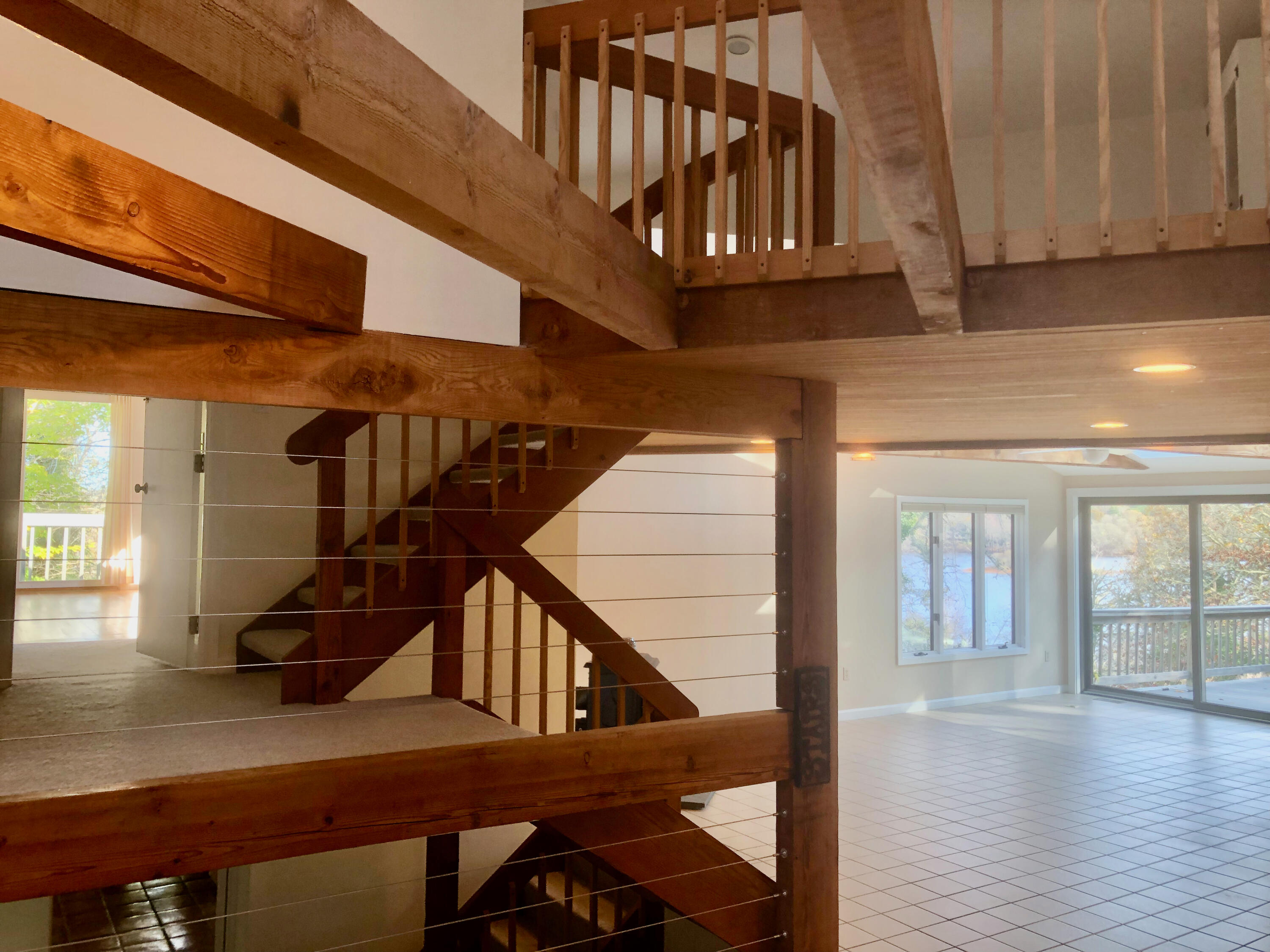 171 Monument Road Orleans, MA 02653 - Photo 19 of 47 a view of entryway with wooden floor