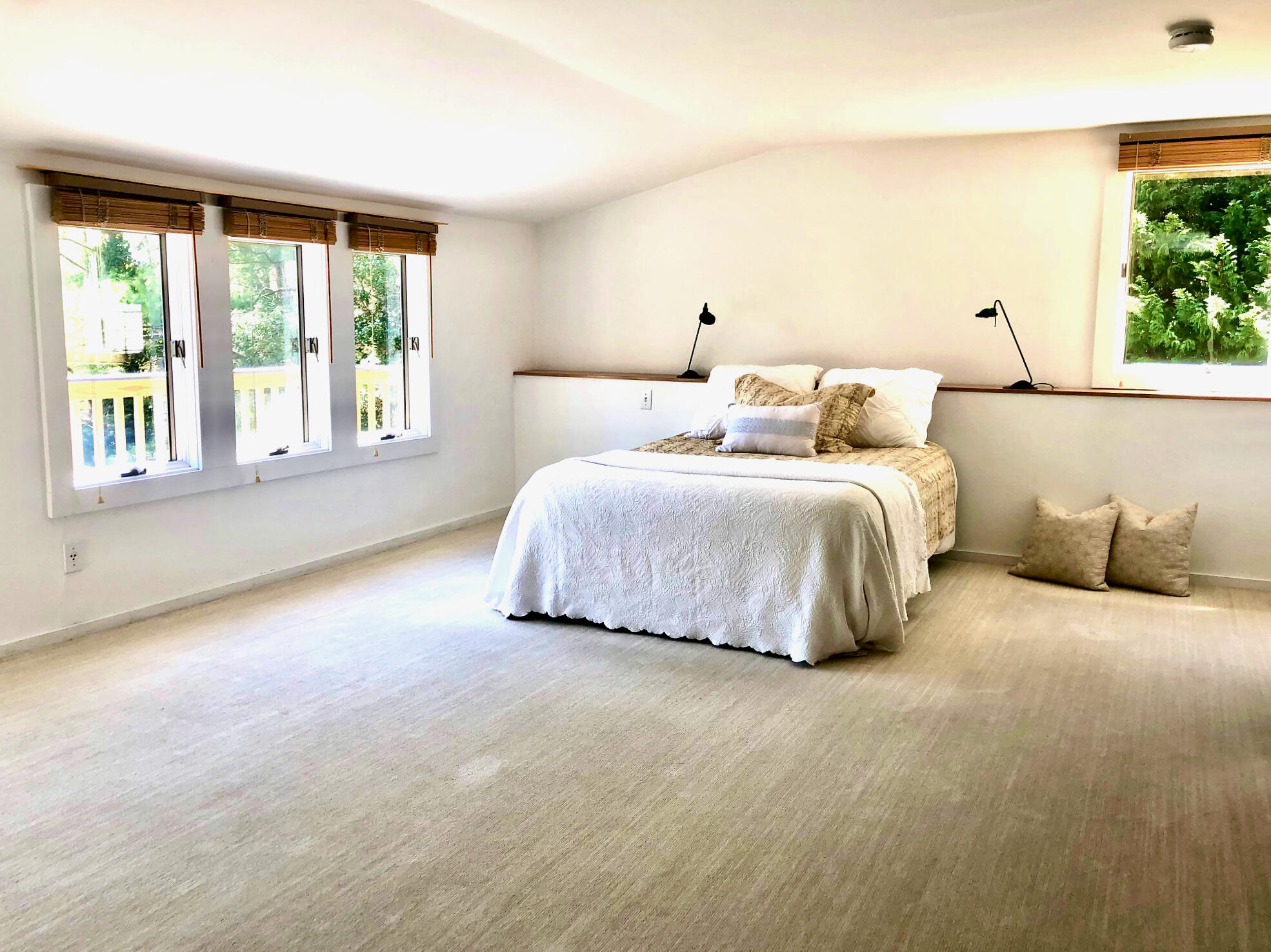 171 Monument Road Orleans, MA 02653 - Photo 22 of 47 a bedroom with bed and a large window