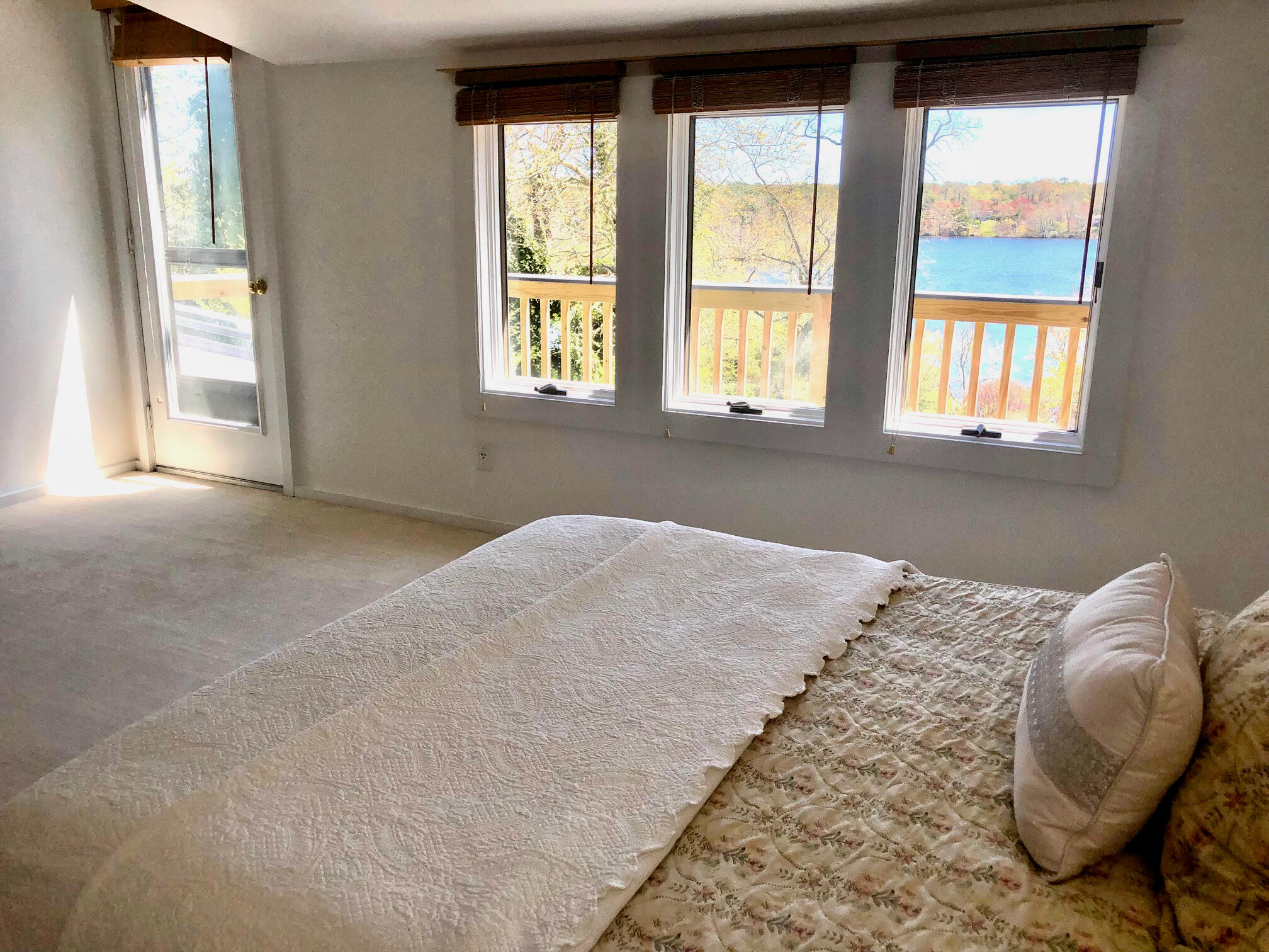 171 Monument Road Orleans, MA 02653 - Photo 23 of 47 a bed room with a bed and a chair