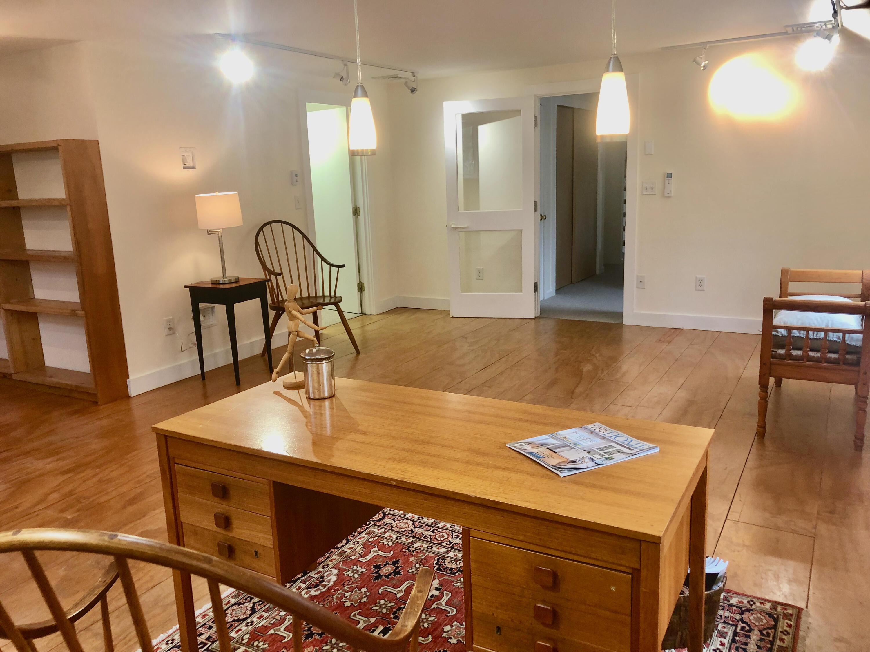 171 Monument Road Orleans, MA 02653 - Photo 27 of 47 a room with table and chairs