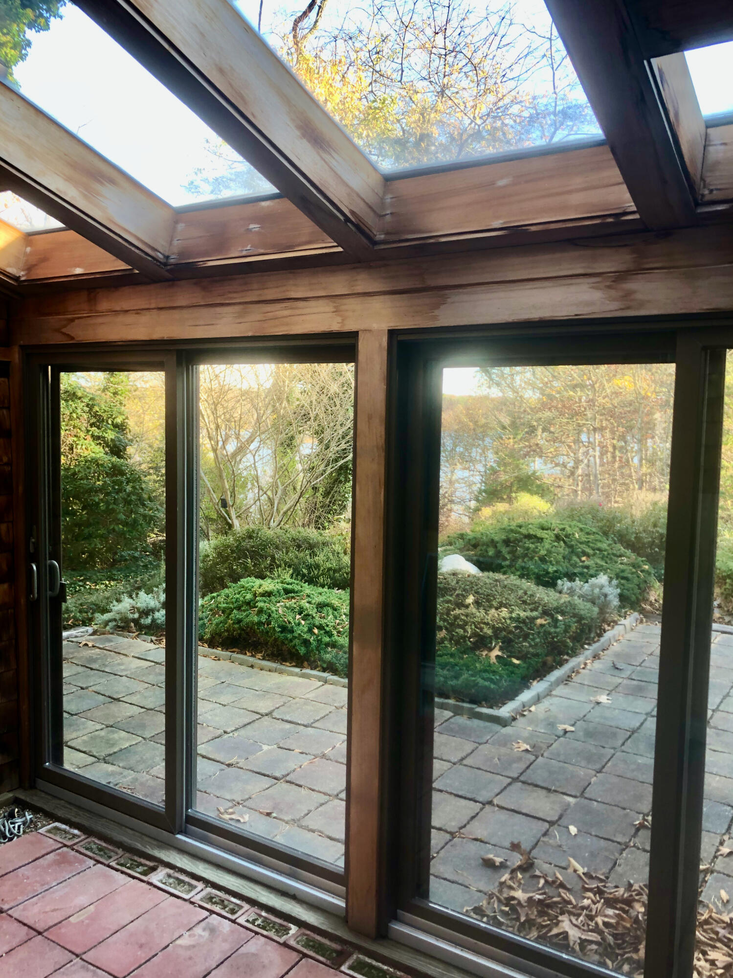 171 Monument Road Orleans, MA 02653 - Photo 35 of 47 a view of a room with a large window and wooden floor