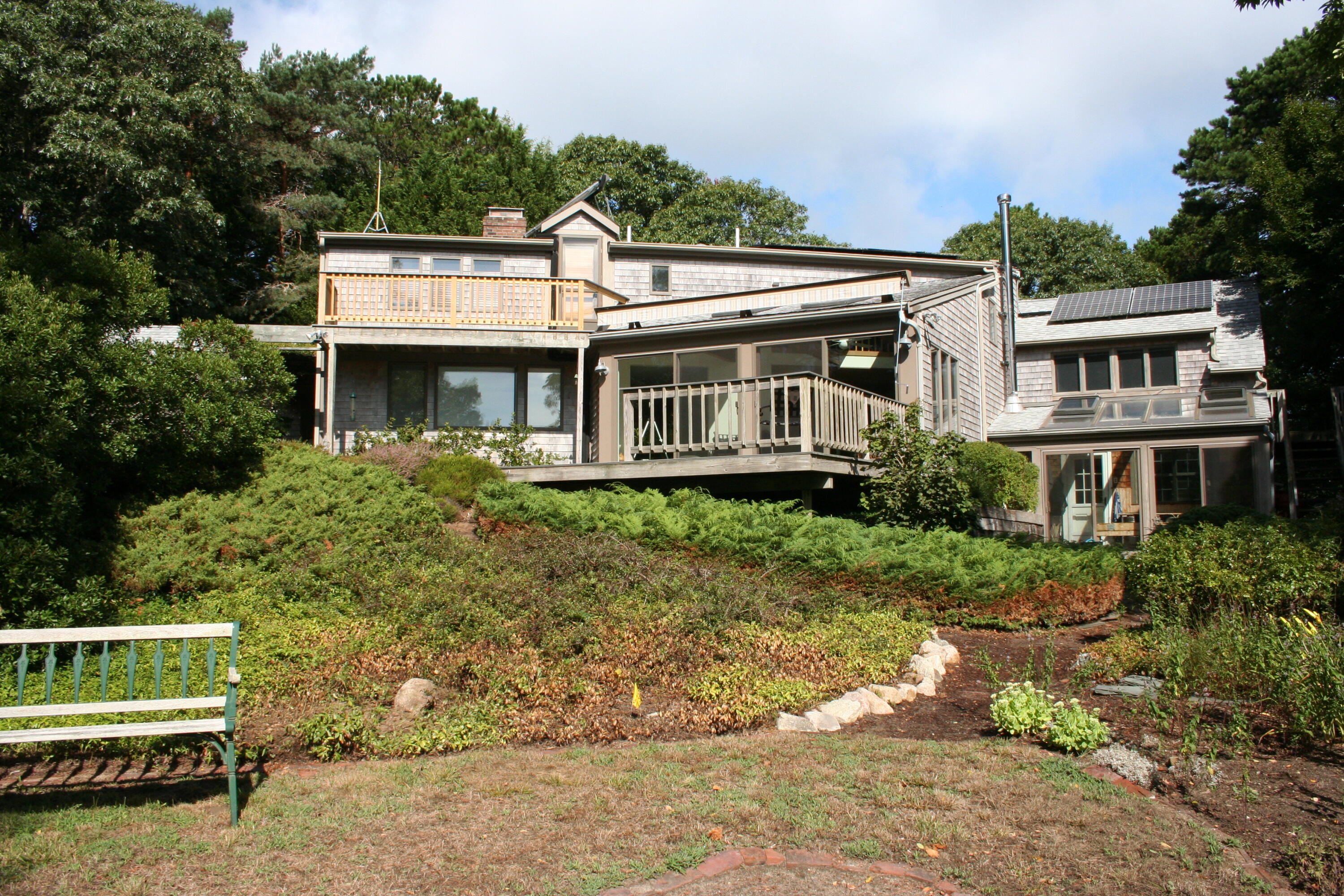 171 Monument Road Orleans, MA 02653 - Photo 39 of 47 a view of a house with a yard