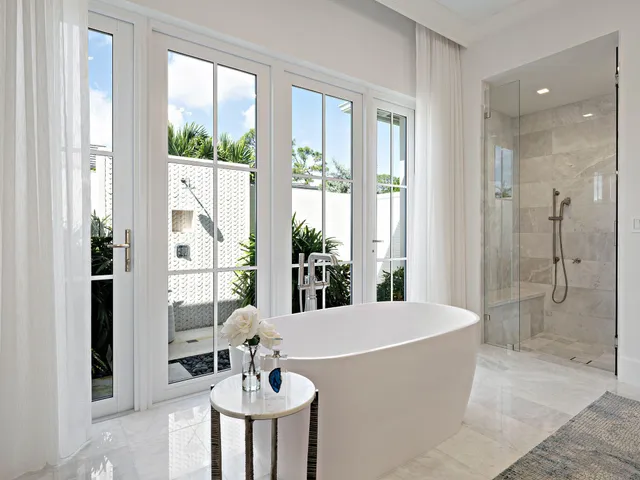 a view of a bath tub sitting in a bathroom
