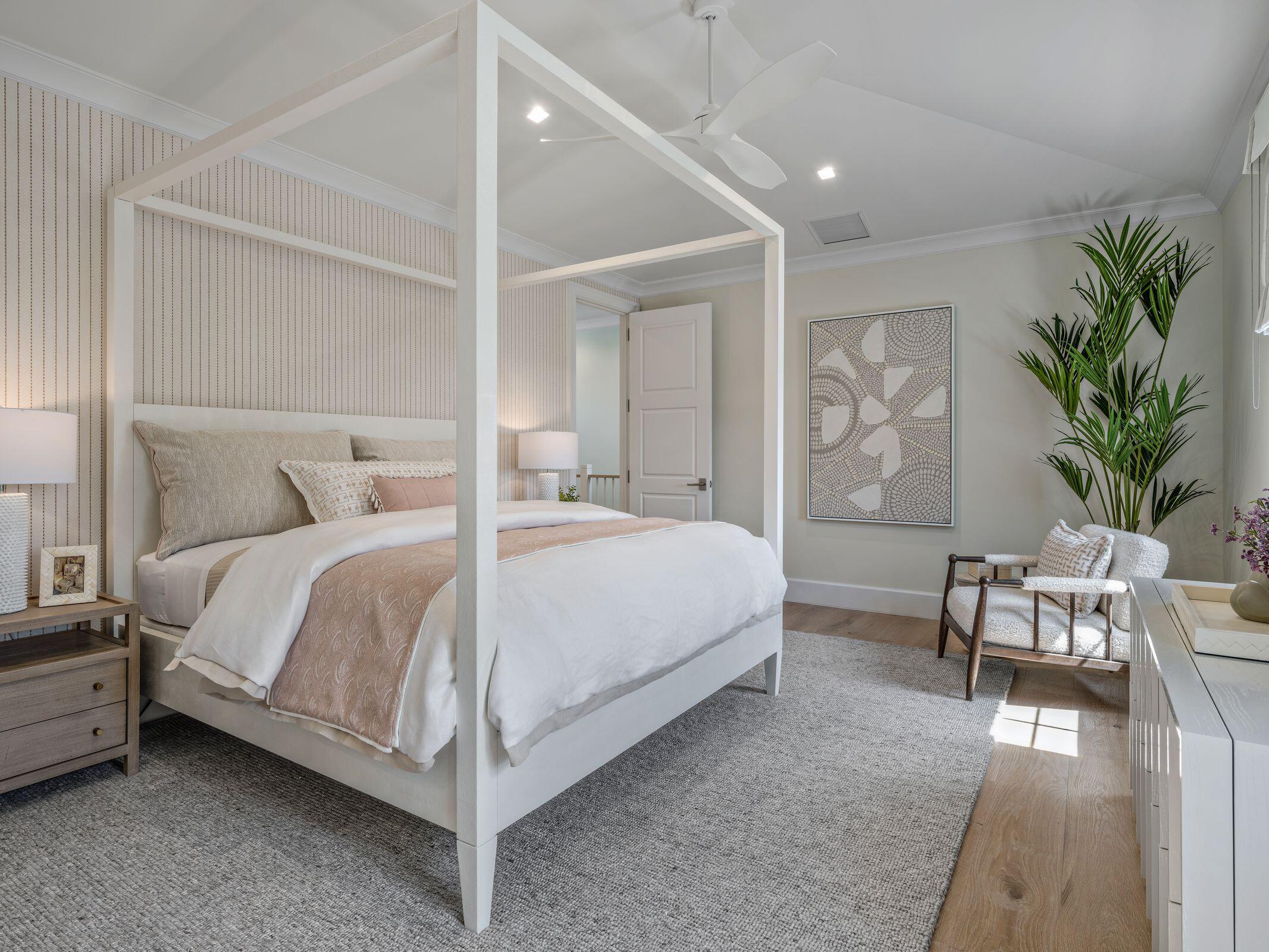 2913 Bluewater Cove Gulf Stream, FL 33483 - Photo 29 of 43 a bed room with a bed and a chair