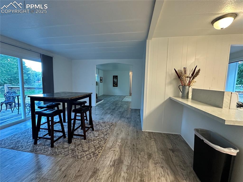 468 Rio Grande Road South Fork, CO 81154 - Photo 17 of 34 a view of a dining room with furniture and wooden floor