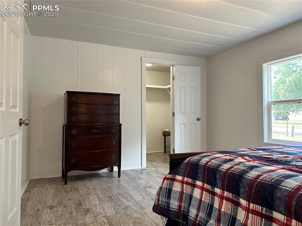 468 Rio Grande Road South Fork, CO 81154 - Photo 23 of 34 a bedroom with a bed and a window