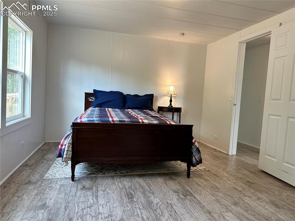 468 Rio Grande Road South Fork, CO 81154 - Photo 24 of 34 a living room with a bed furniture and a window