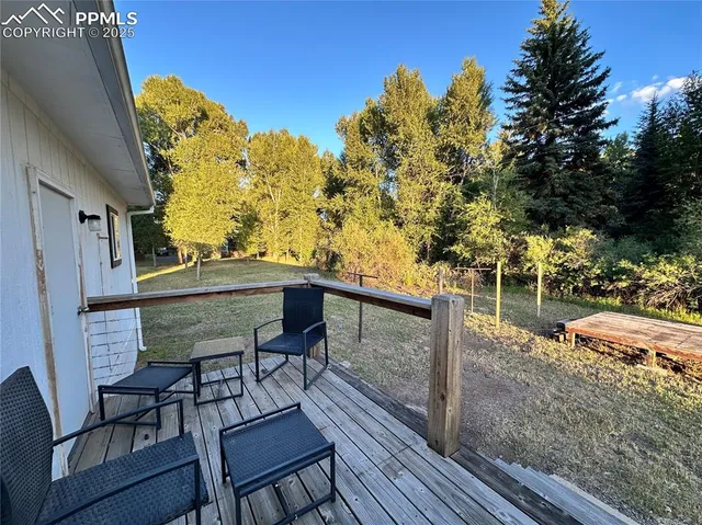 a view of a back yard of the house