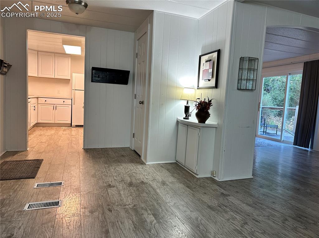 468 Rio Grande Road South Fork, CO 81154 - Photo 6 of 34 a view of a living room and a wooden floor