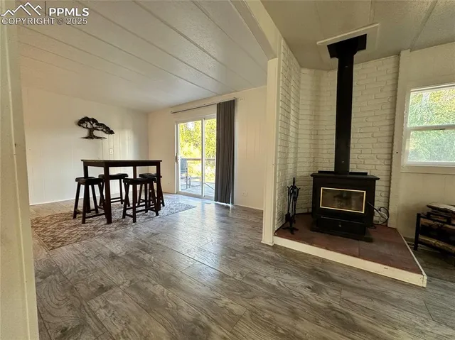 a view of livingroom with furniture and windows