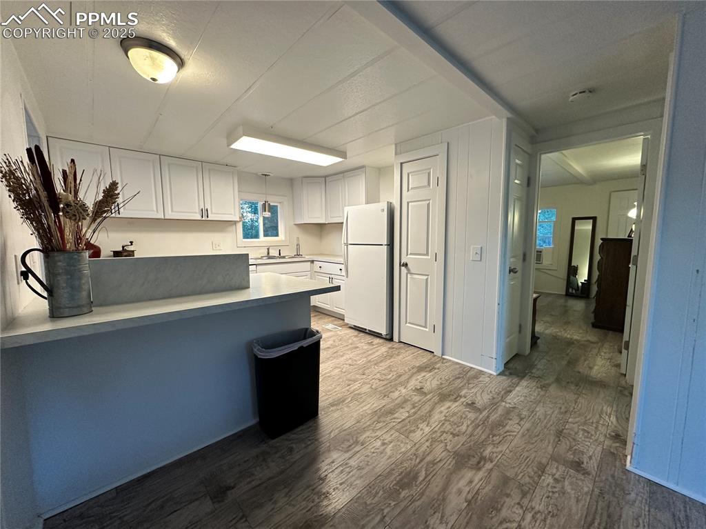 468 Rio Grande Road South Fork, CO 81154 - Photo 10 of 34 a kitchen with stainless steel appliances a sink stove and refrigerator
