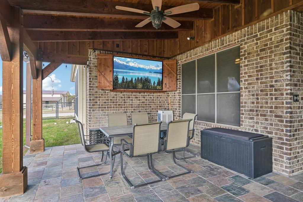 101 Maral Lane Azle, TX 76020 - Photo 25 of 36 a building outdoor space with patio furniture and a fireplace