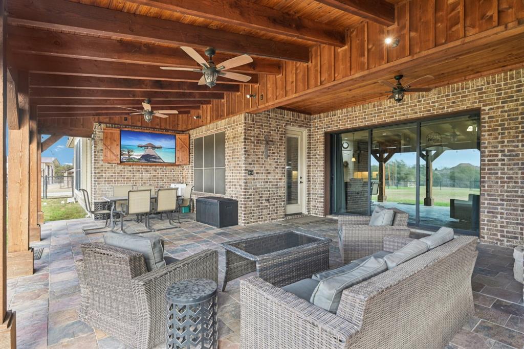 101 Maral Lane Azle, TX 76020 - Photo 28 of 36 a view of an outdoor dining space with a patio