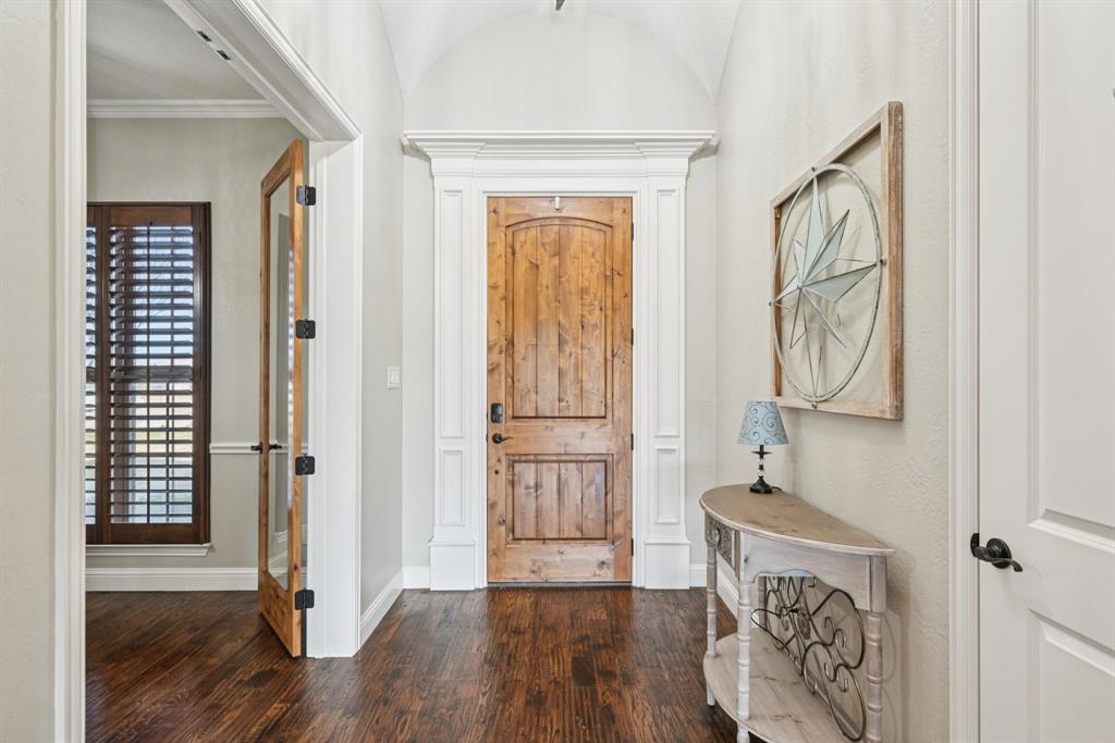 101 Maral Lane Azle, TX 76020 - Photo 4 of 36 a view of an entryway with wooden floor
