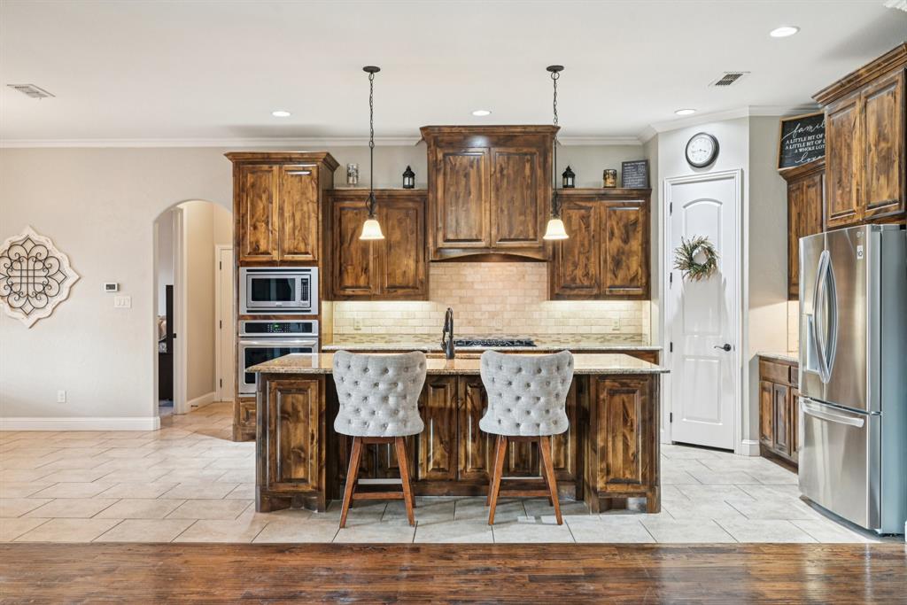 101 Maral Lane Azle, TX 76020 - Photo 8 of 36 a view of a dining room with furniture