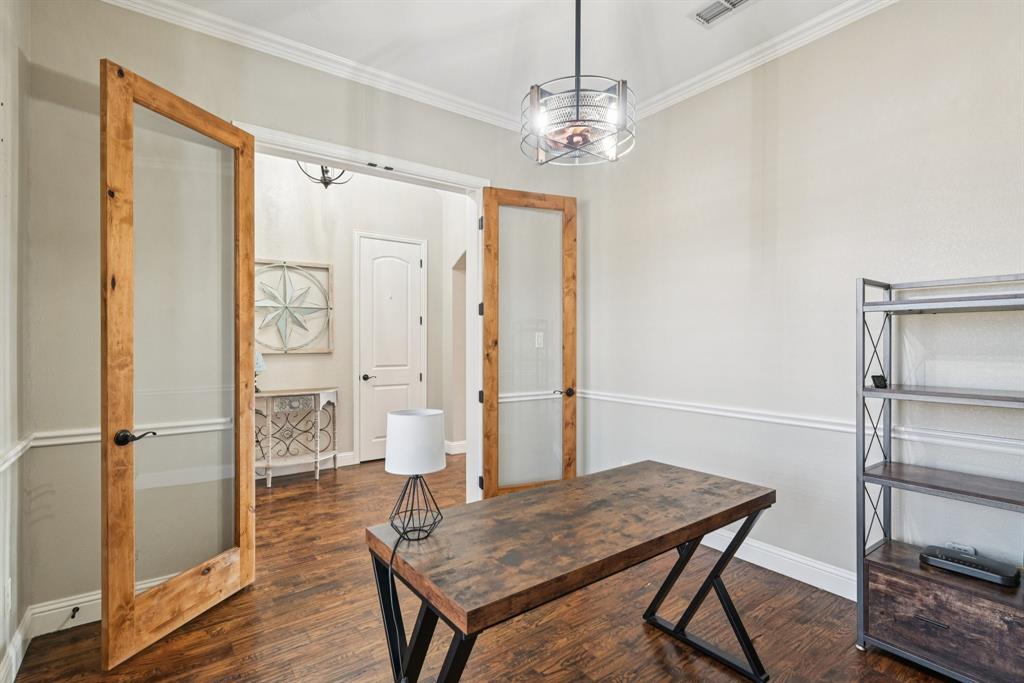 101 Maral Lane Azle, TX 76020 - Photo 10 of 36 a view of a livingroom with furniture and wooden floor