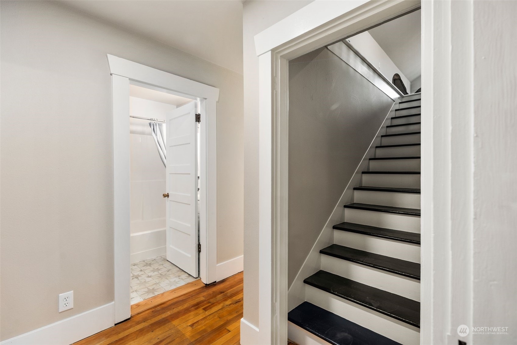 25321 South Prairie Road East Buckley, WA 98321 - Photo 17 of 35 a view of a hallway with staircase and white walls