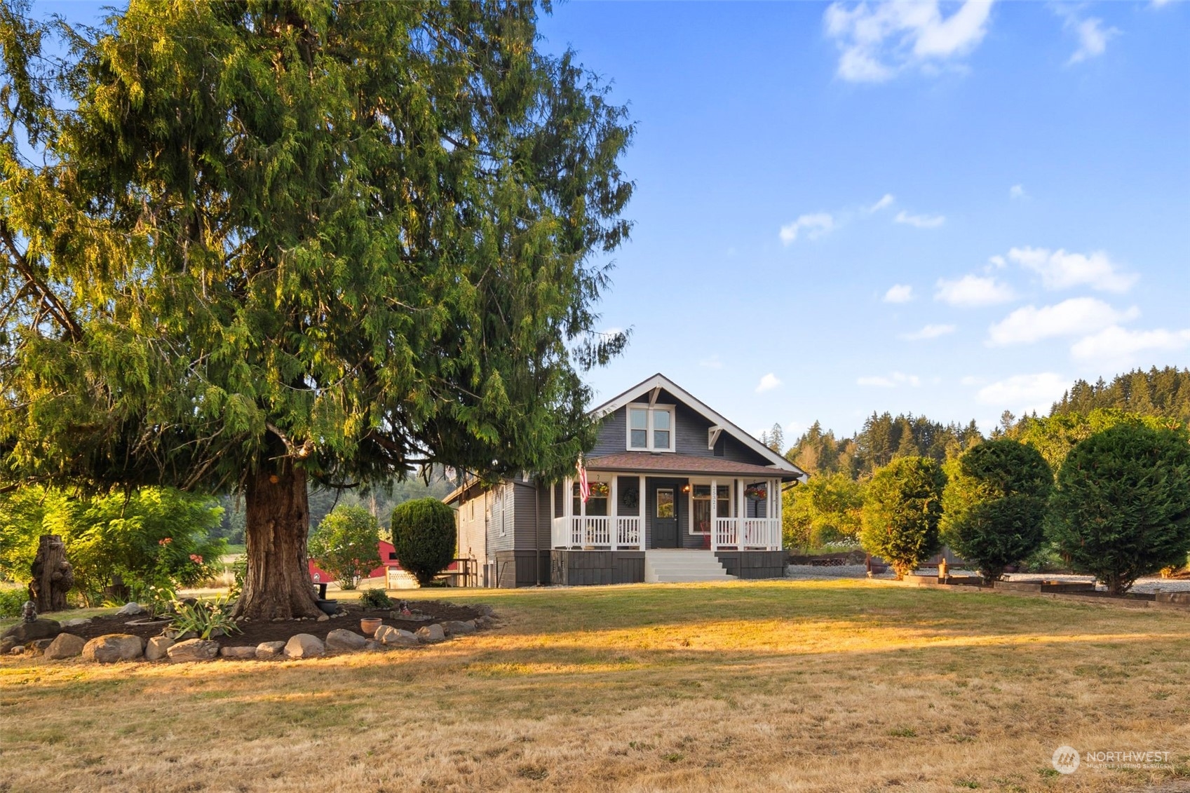 25321 South Prairie Road East Buckley, WA 98321 - Photo 5 of 35 a front view of a house with a yard