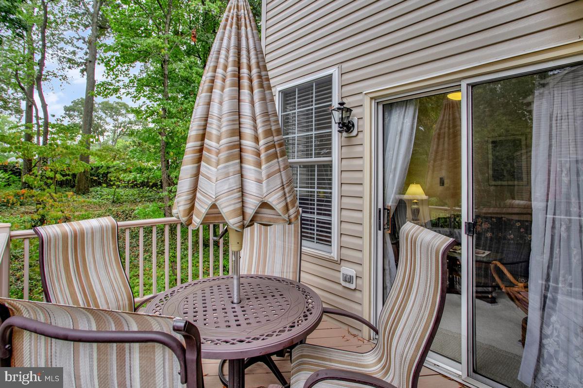 224 Tilden Way, Unit 224 Edgewater, MD 21037 - Photo 38 of 49 Deck w/ slider from the family room/sunroom.