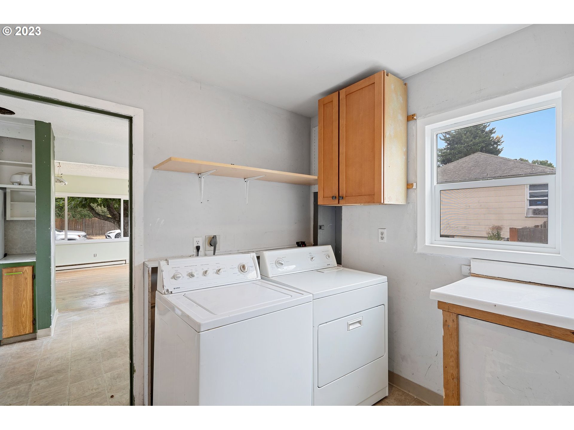 5119 Southeast 68th Avenue Portland, OR 97206 - Photo 14 of 43 a utility room with closet dryer and washer