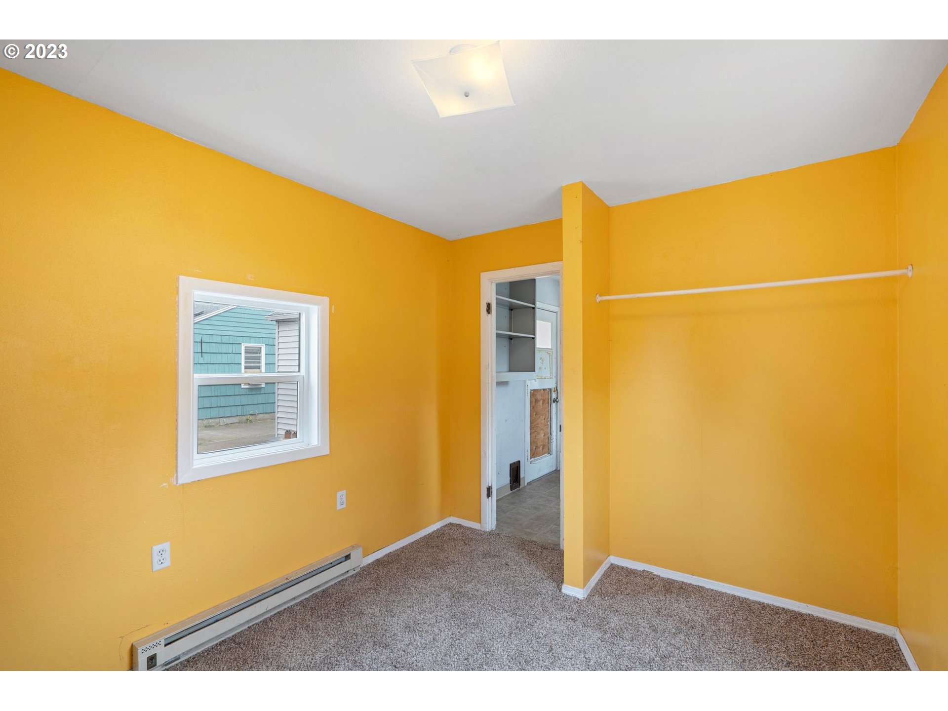 5119 Southeast 68th Avenue Portland, OR 97206 - Photo 16 of 43 a view of a big room with wooden floor