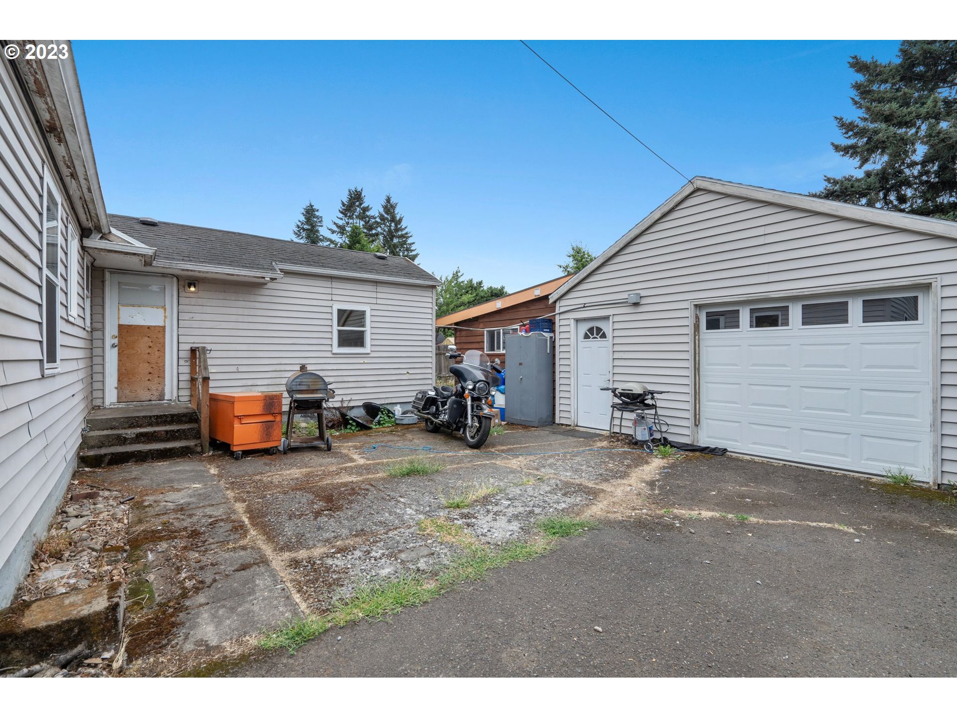 5119 Southeast 68th Avenue Portland, OR 97206 - Photo 18 of 43 a view of a house with backyard