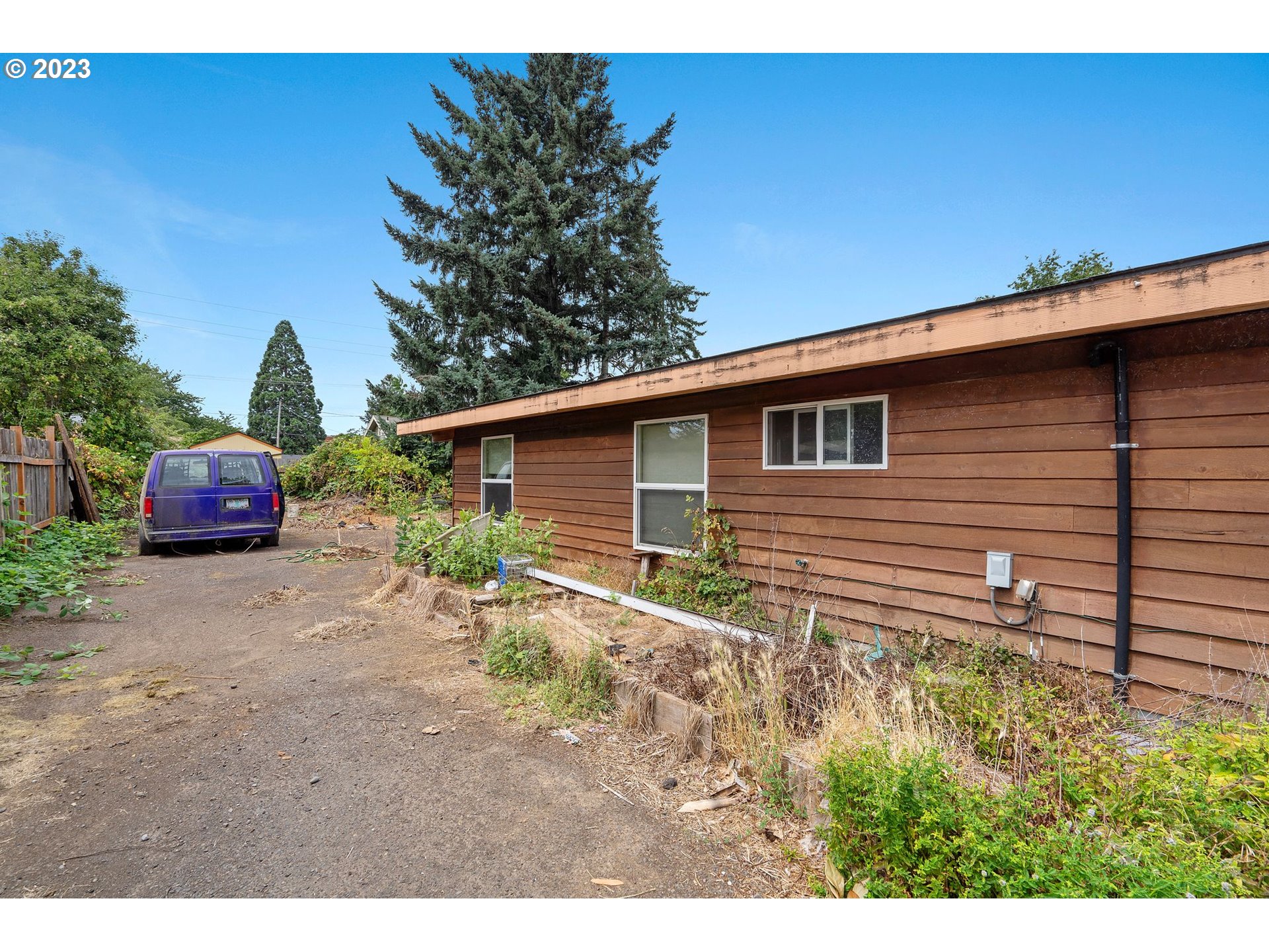5119 Southeast 68th Avenue Portland, OR 97206 - Photo 28 of 43 a house view with a backyard space