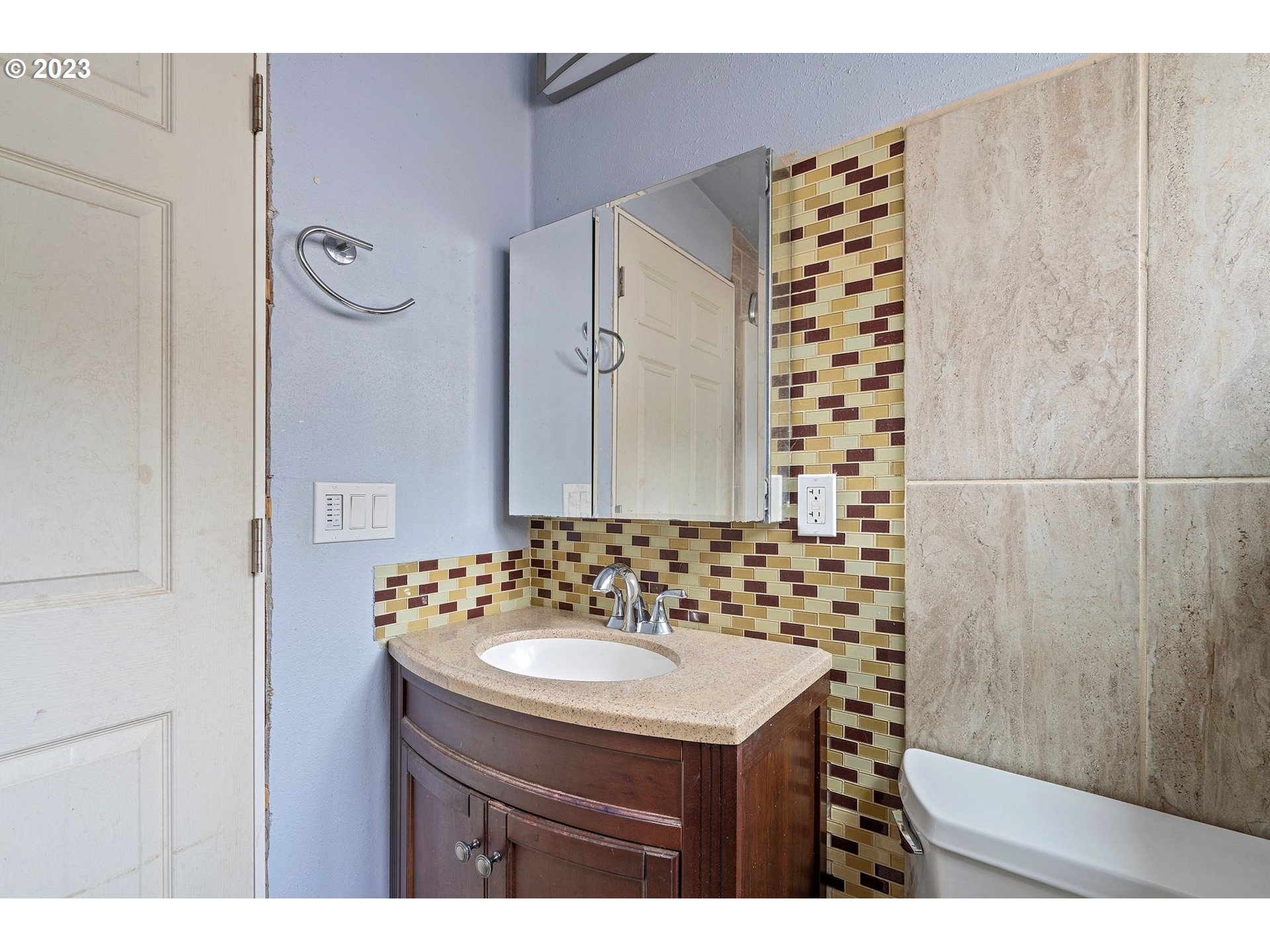5119 Southeast 68th Avenue Portland, OR 97206 - Photo 39 of 43 a bathroom with a sink and a mirror
