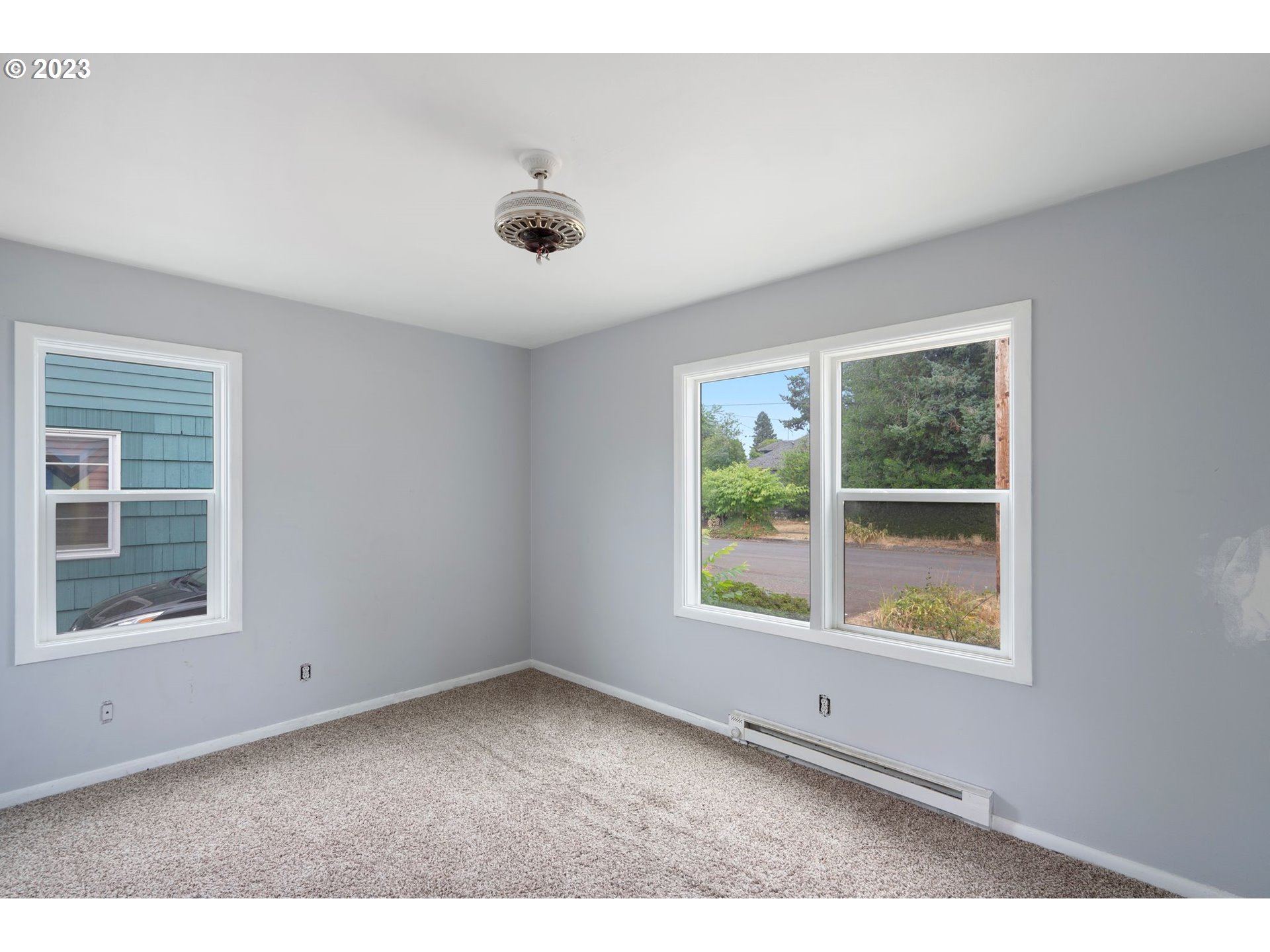 5119 Southeast 68th Avenue Portland, OR 97206 - Photo 7 of 43 a view of an empty room with a window