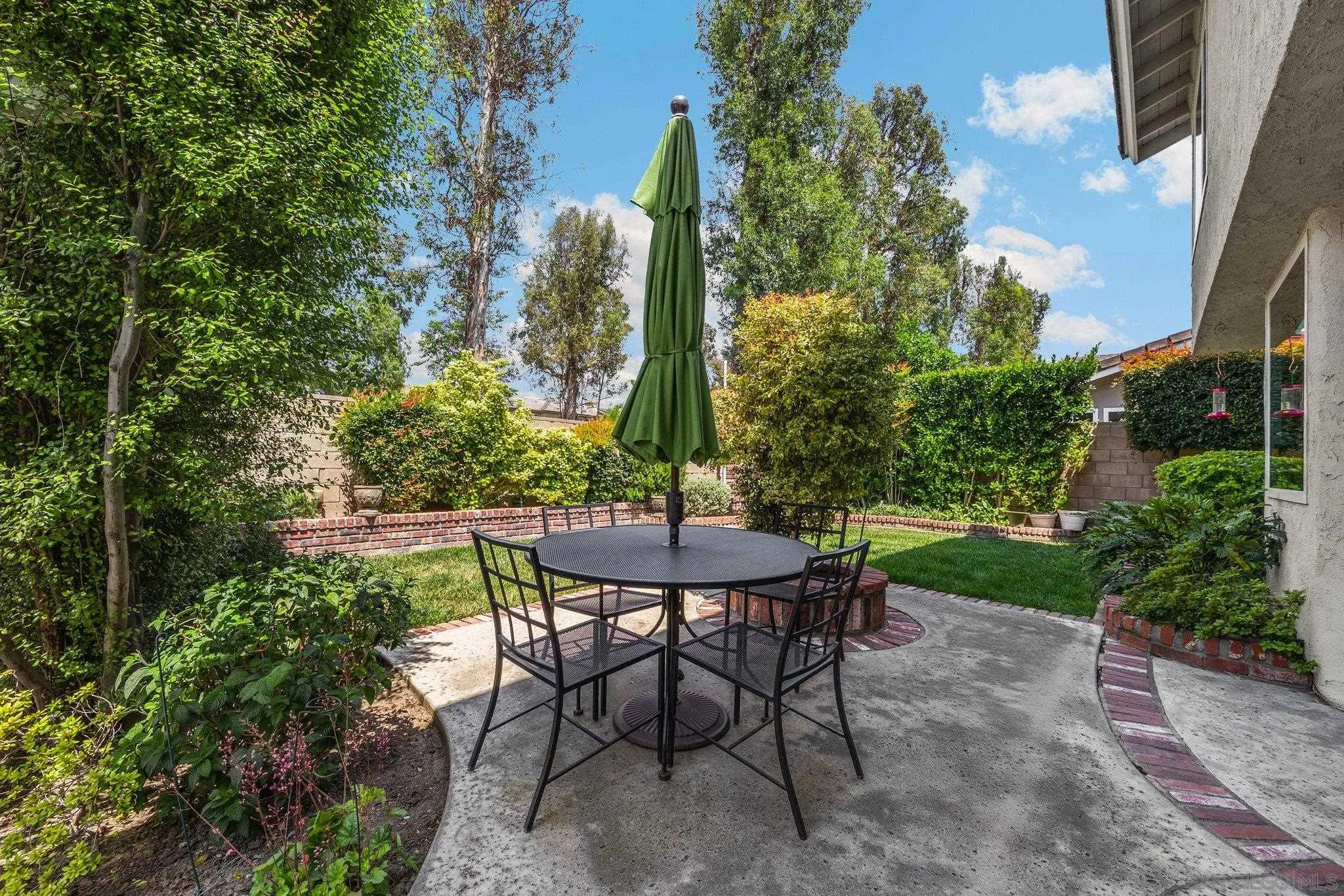 40 Brena Irvine, CA 92620 - Photo 32 of 39 a view of a chairs and table in the garden