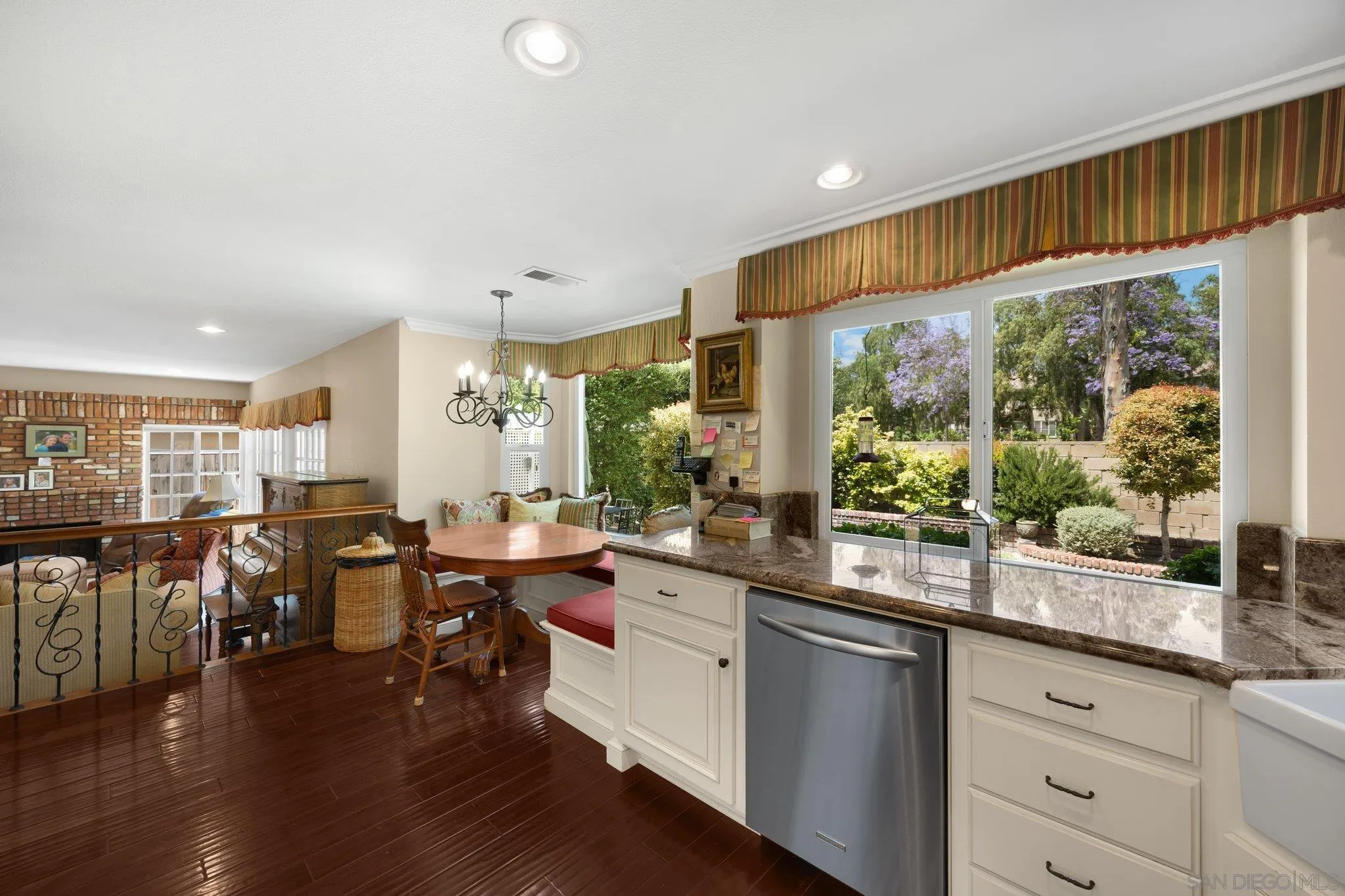 40 Brena Irvine, CA 92620 - Photo 6 of 39 a kitchen with lots of counter top space and dining table