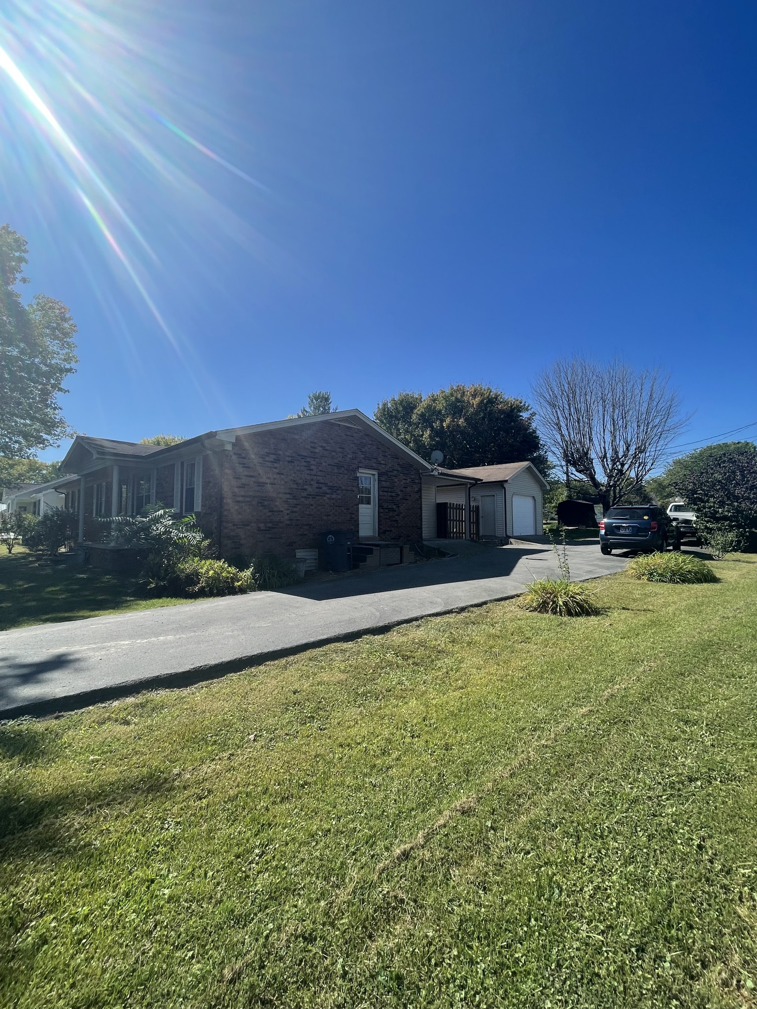851 Akersville Road Lafayette, TN 37083 - Photo 13 of 29 a view of a house with a yard