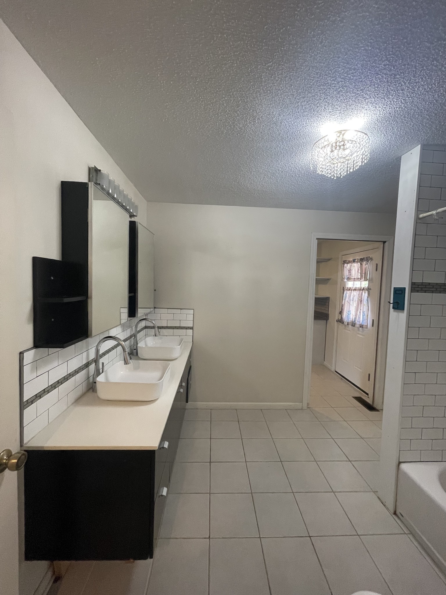 851 Akersville Road Lafayette, TN 37083 - Photo 17 of 29 a bathroom with a sink a toilet and mirror