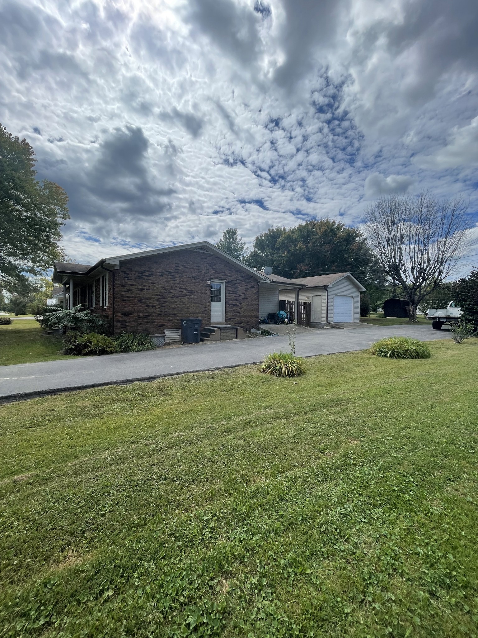 851 Akersville Road Lafayette, TN 37083 - Photo 2 of 29 a swimming pool view with a seating space