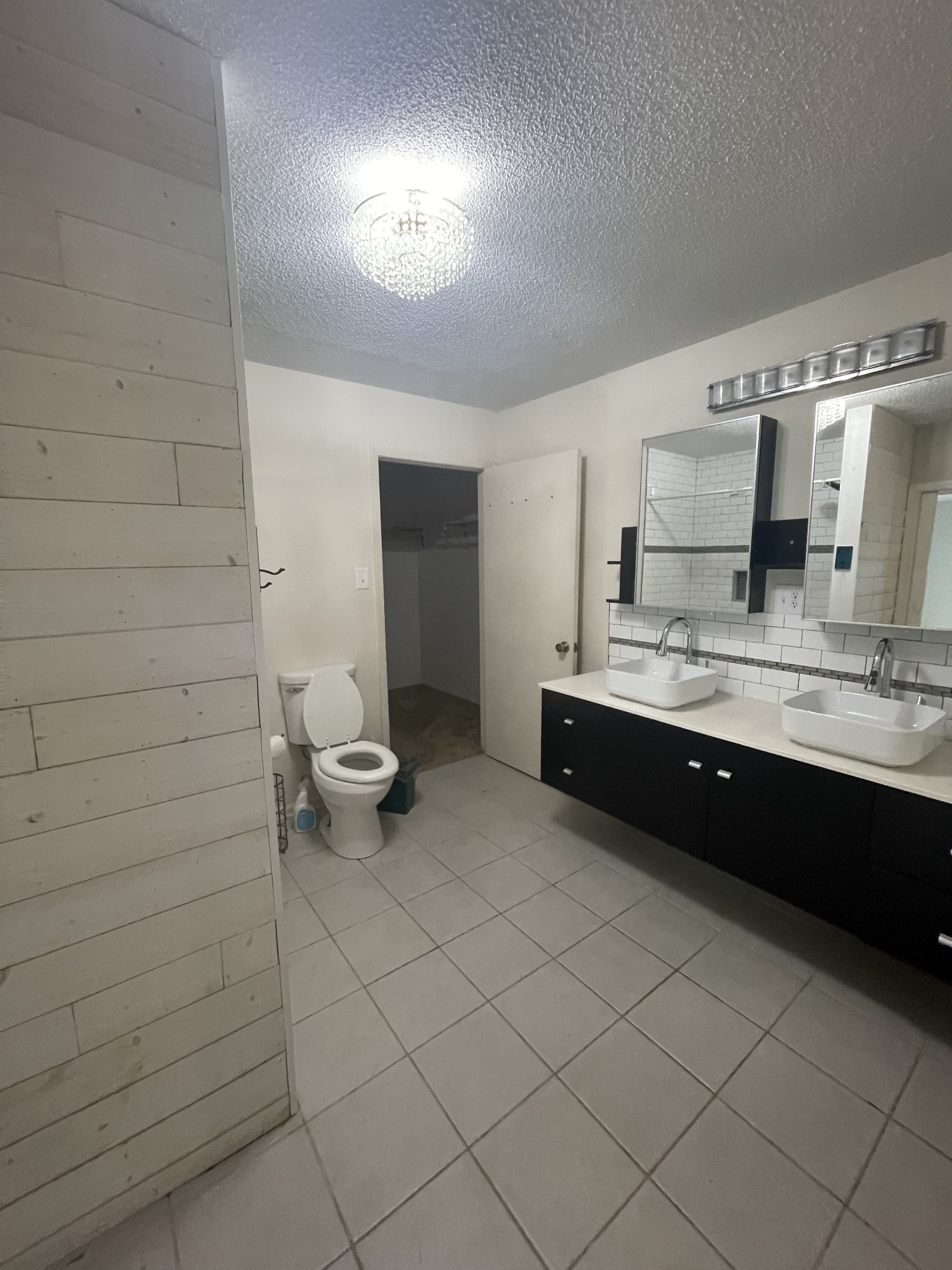 851 Akersville Road Lafayette, TN 37083 - Photo 25 of 29 a bathroom with a sink and a mirror
