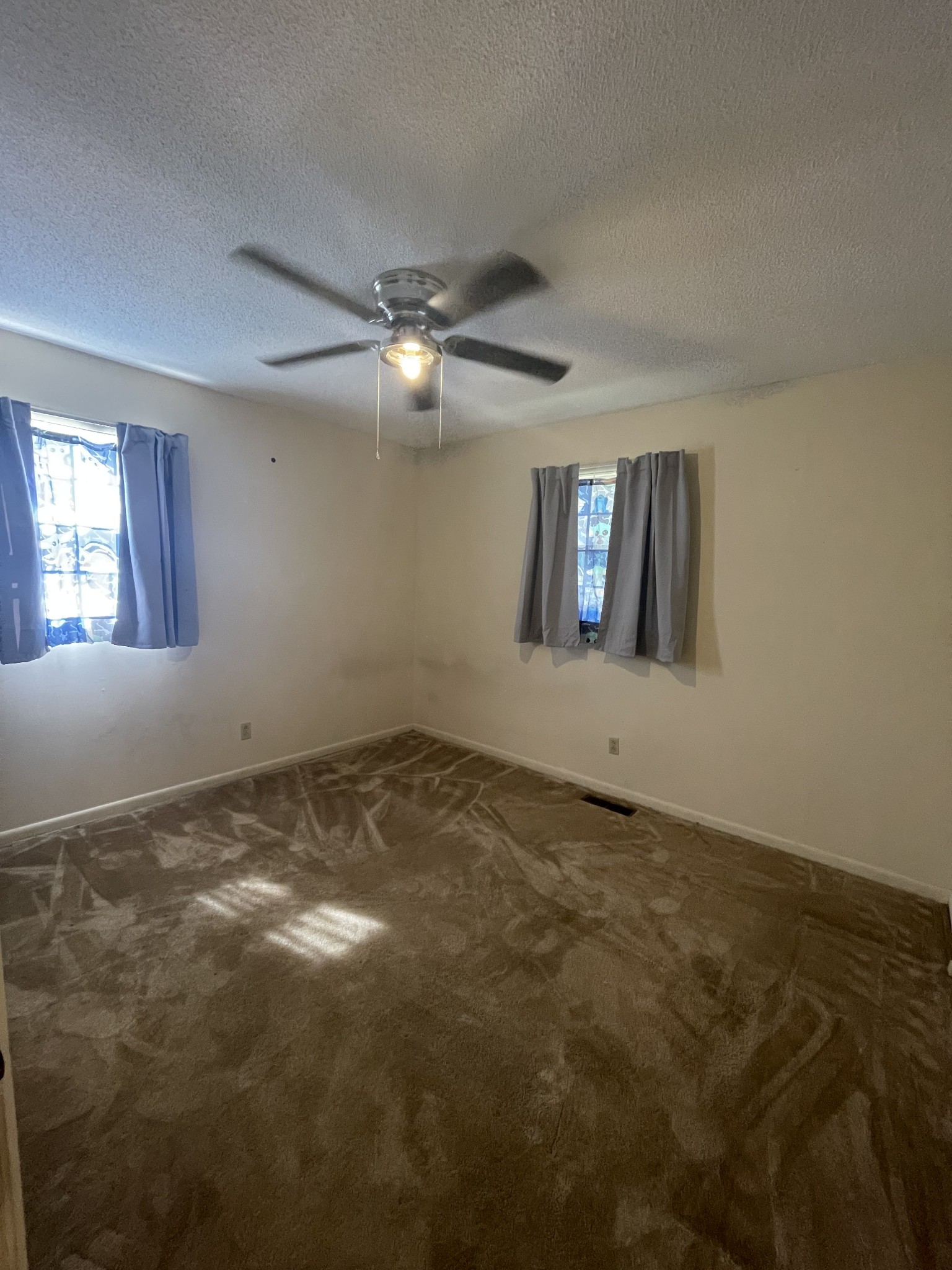 851 Akersville Road Lafayette, TN 37083 - Photo 27 of 29 a view of an empty room with a window