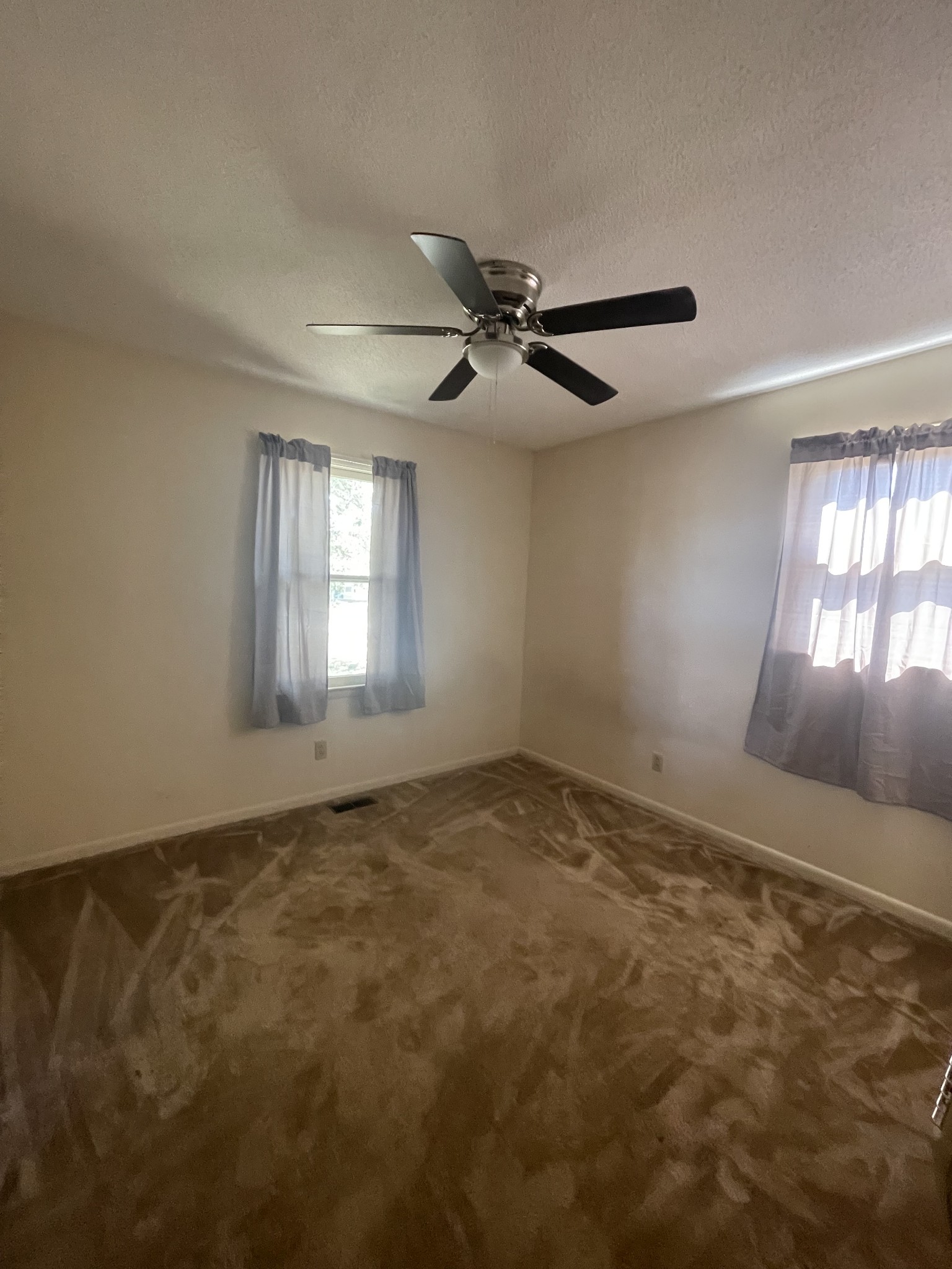 851 Akersville Road Lafayette, TN 37083 - Photo 28 of 29 a view of an empty room and window