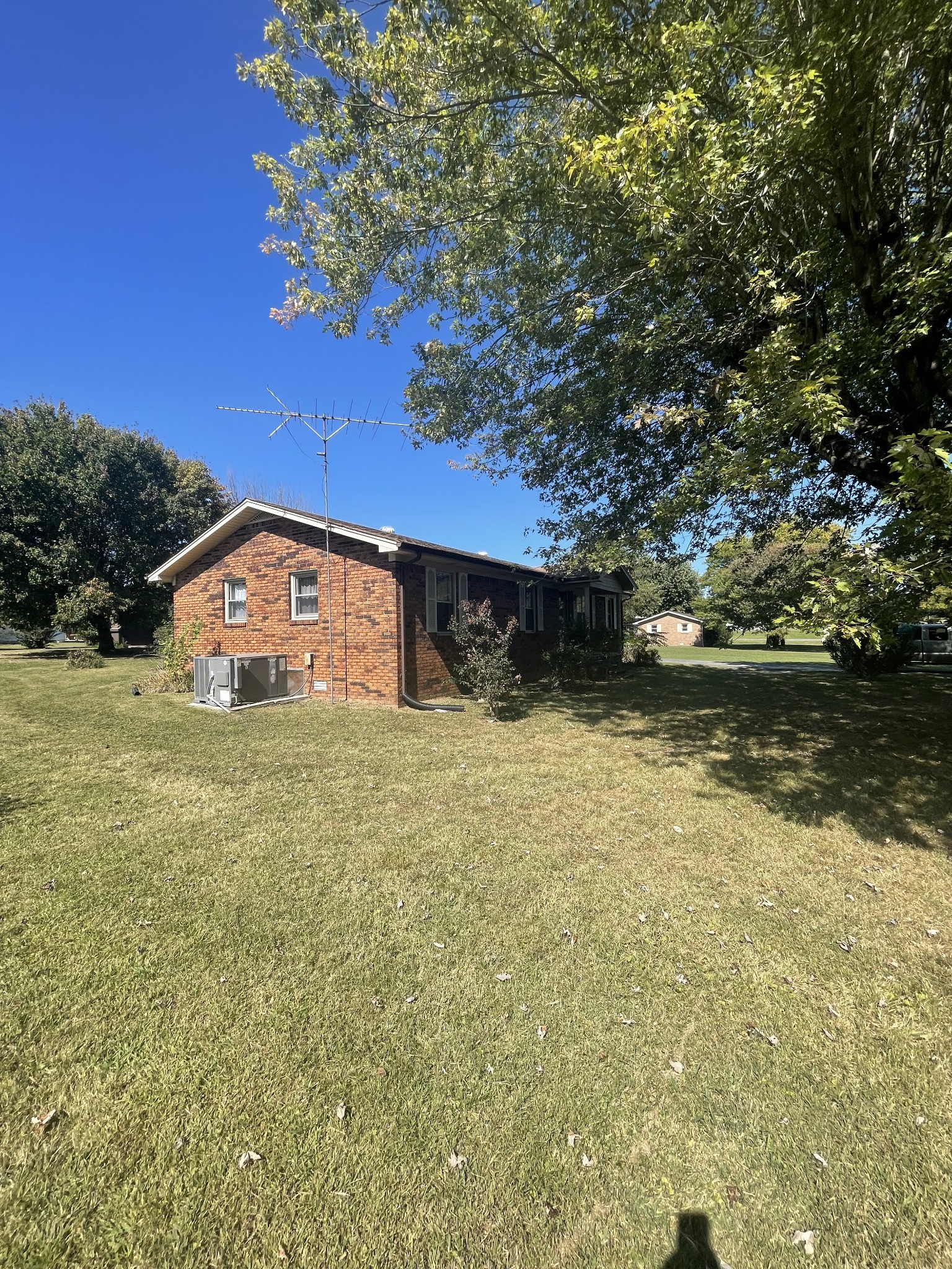 851 Akersville Road Lafayette, TN 37083 - Photo 6 of 29 a front view of a house with a yard