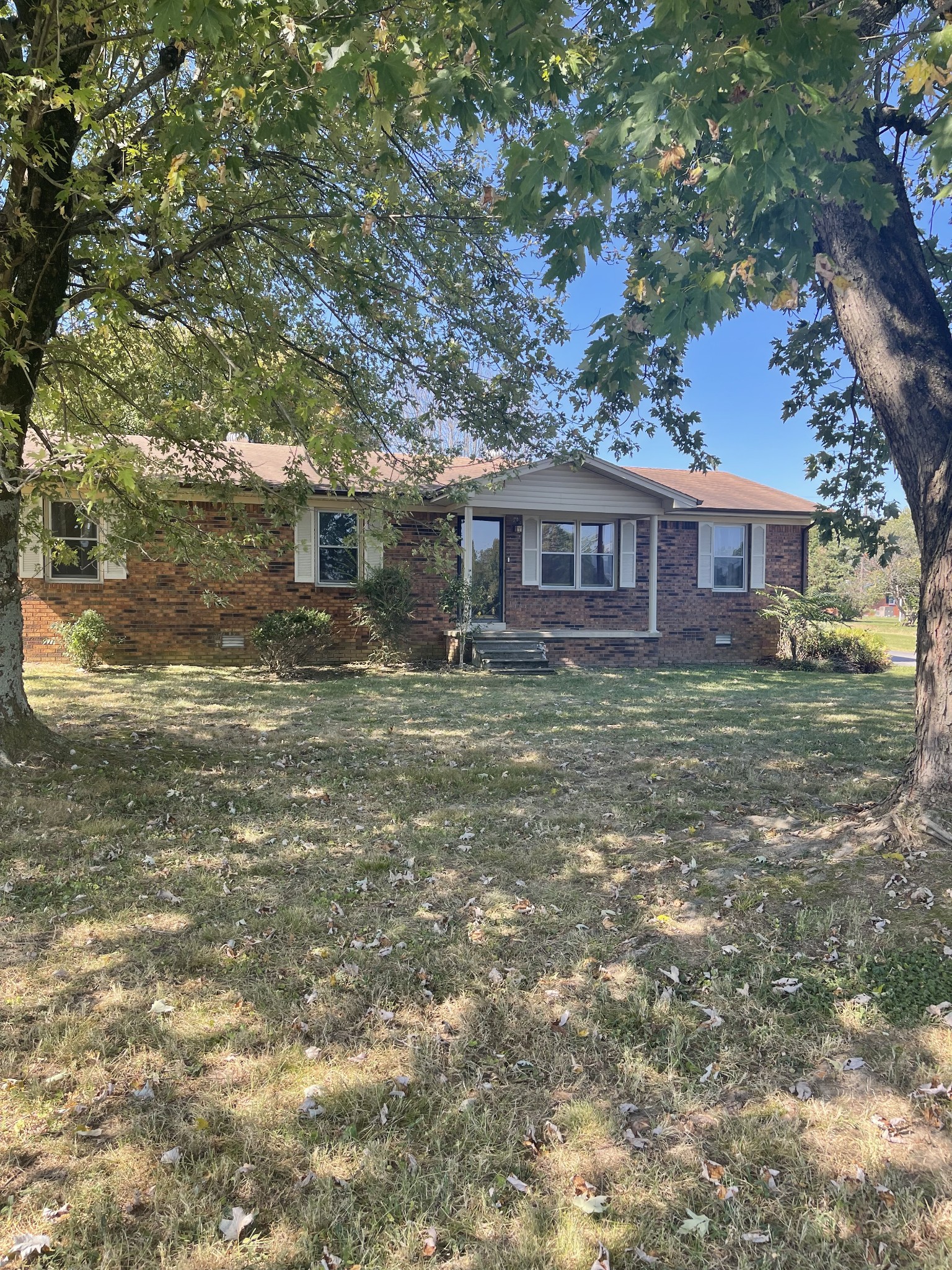 851 Akersville Road Lafayette, TN 37083 - Photo 8 of 29 front view of a house with a yard