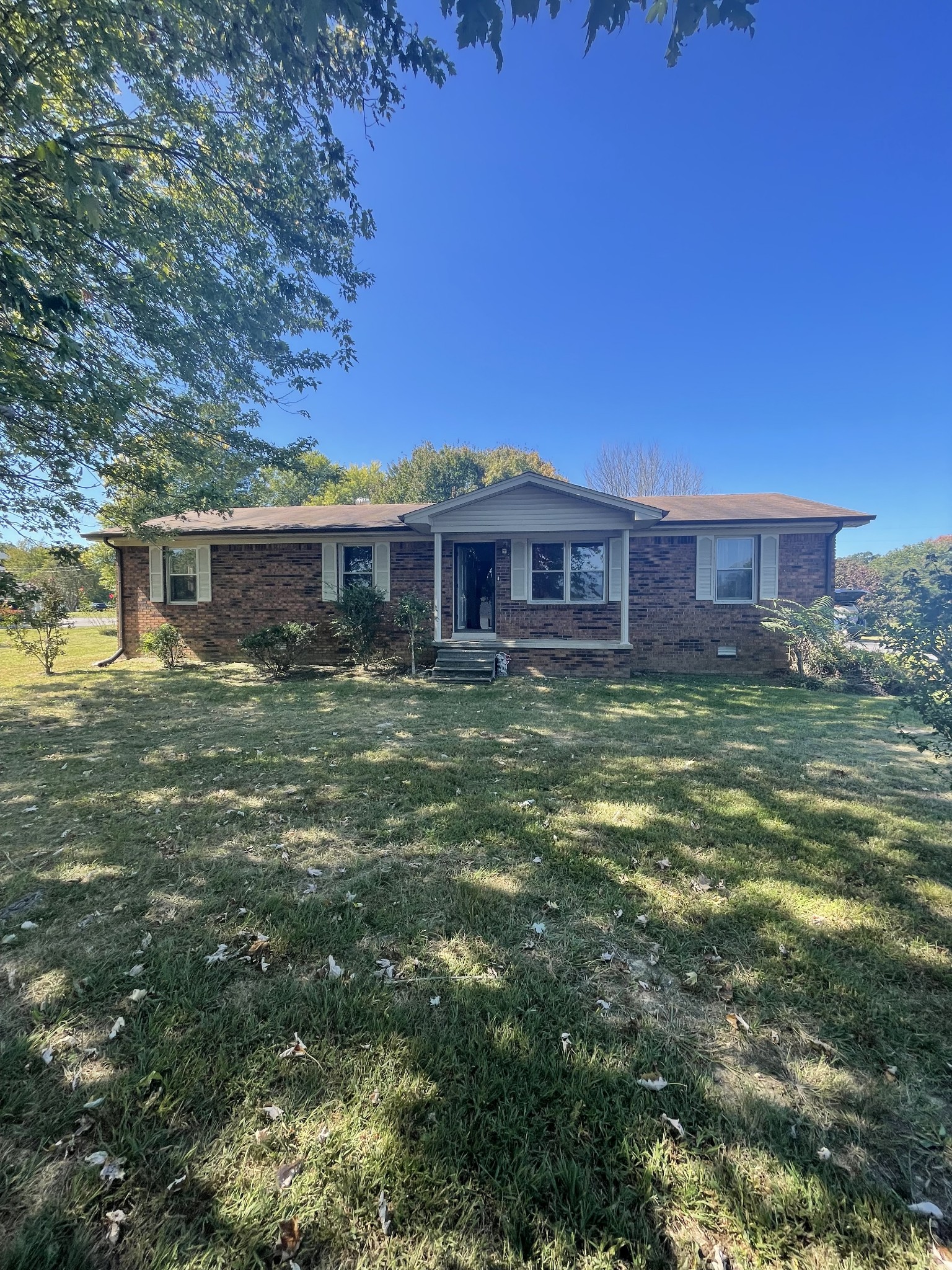 851 Akersville Road Lafayette, TN 37083 - Photo 9 of 29 a view of a house with a big yard